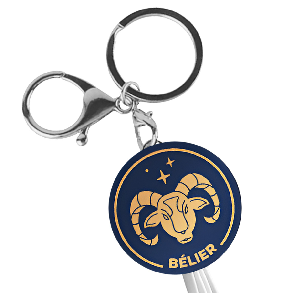 Porte-clés avec symbole du Bélier et étoiles sur fond bleu foncé.