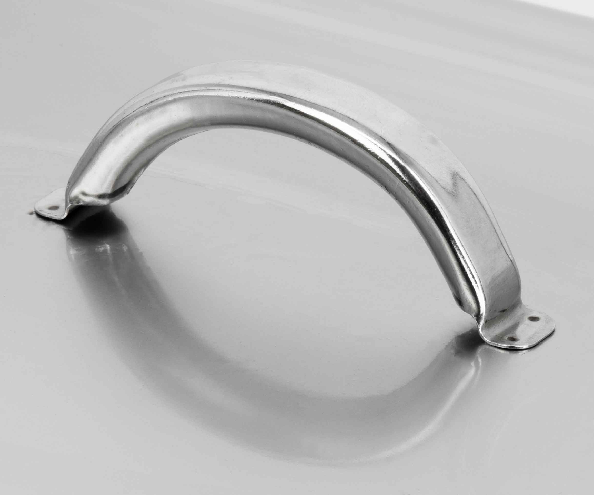 A curved metal handle with mounting holes on a smooth, reflective surface.