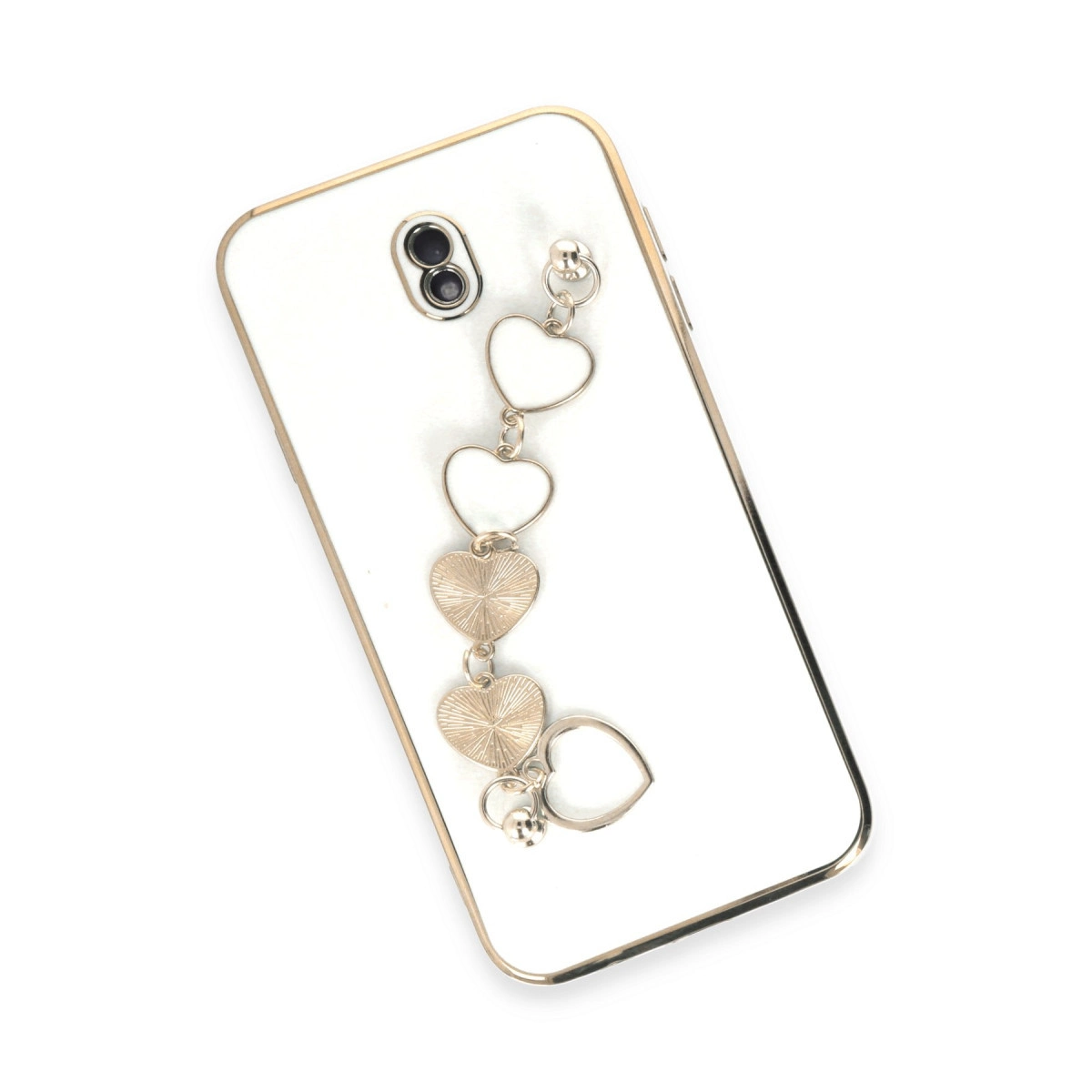 Altın çerçeveli ve kalp zincirli beyaz telefon.