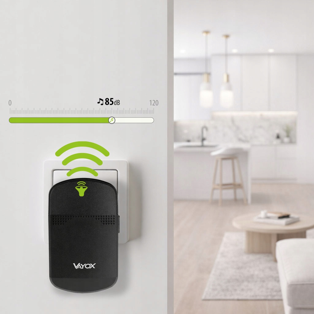 Czarna wtyczka w gniazdku ze skalą głośności i tłem kuchennym.