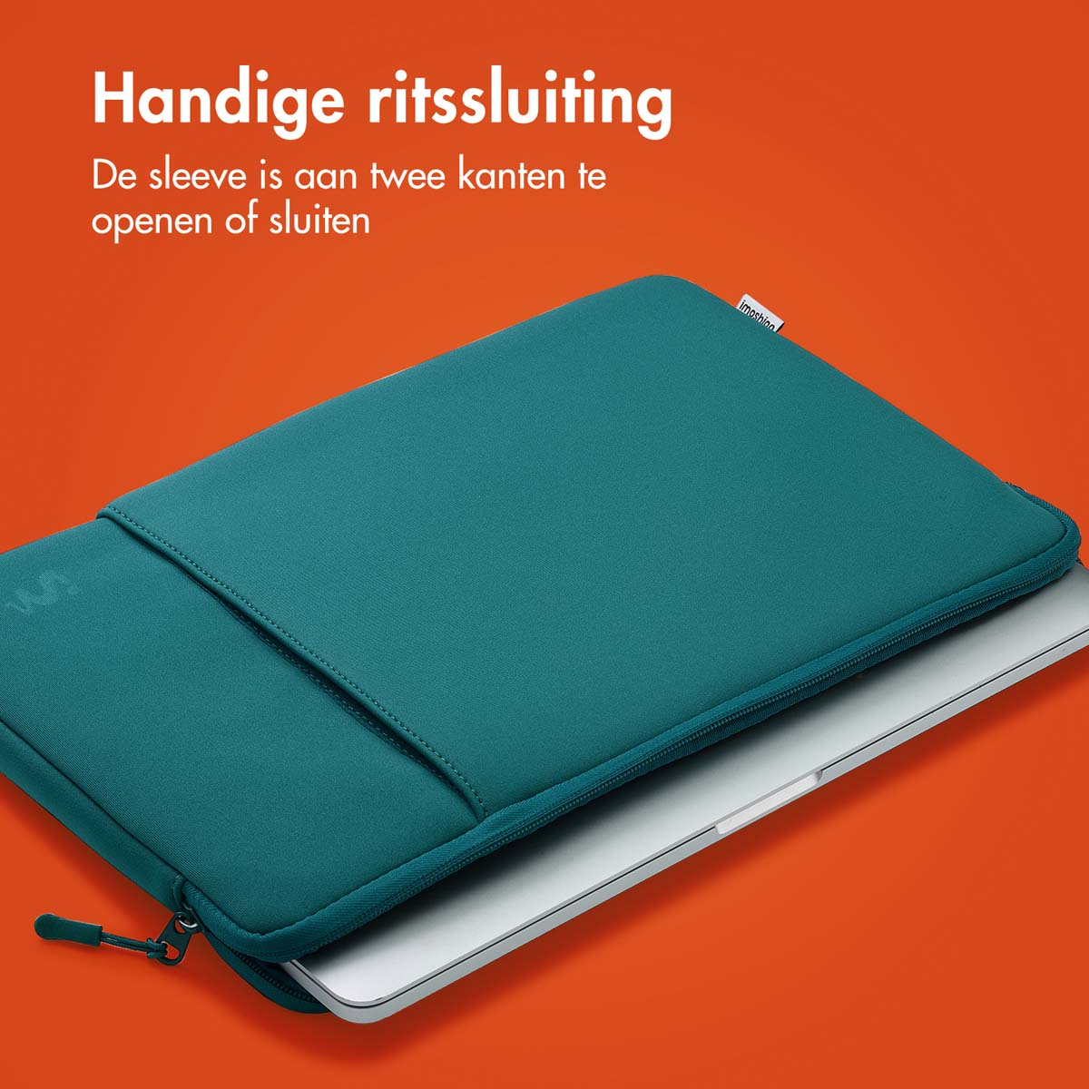 A teal laptop sleeve rests on a silver laptop. The zipper is partially open.