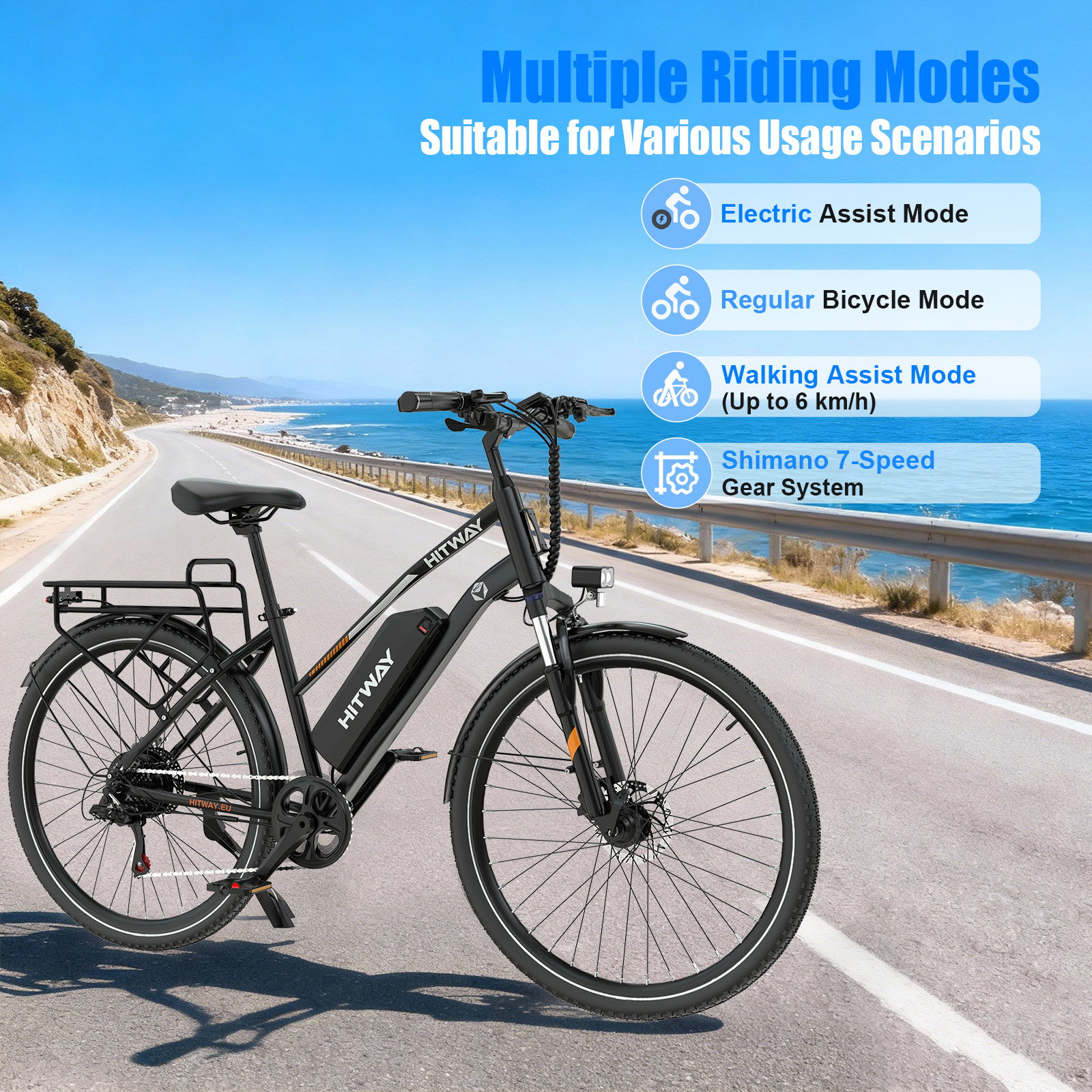 Black e-bike with rear rack riding on a coastal road.