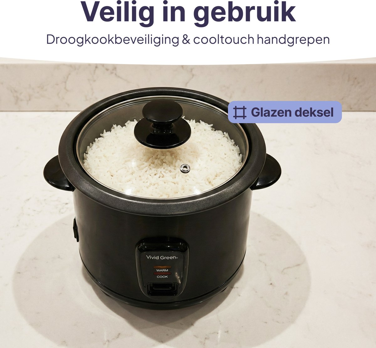 A black rice cooker with a glass lid full of rice sits on a marble countertop.