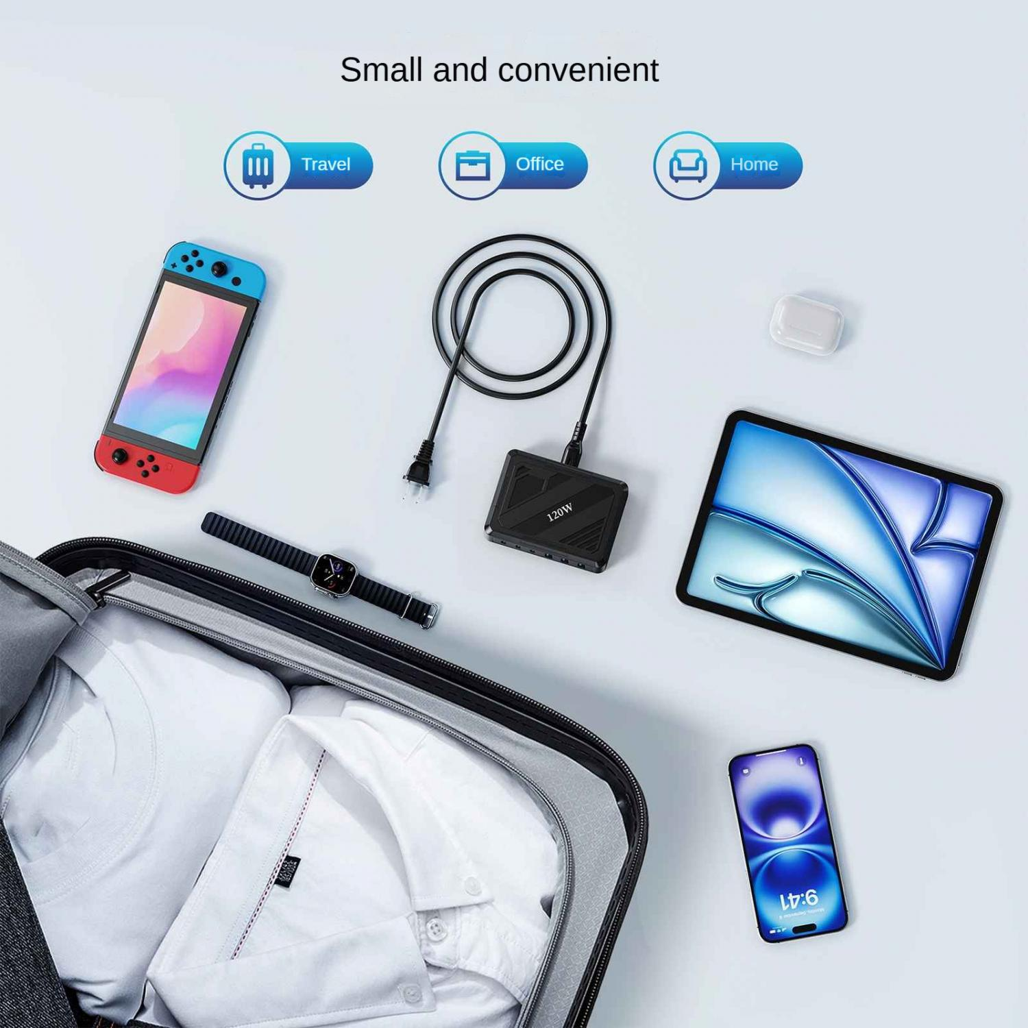 Ein Nintendo Switch, Ladegerät, Tablet, Handy, Uhr und Kleidung in einem Koffer.