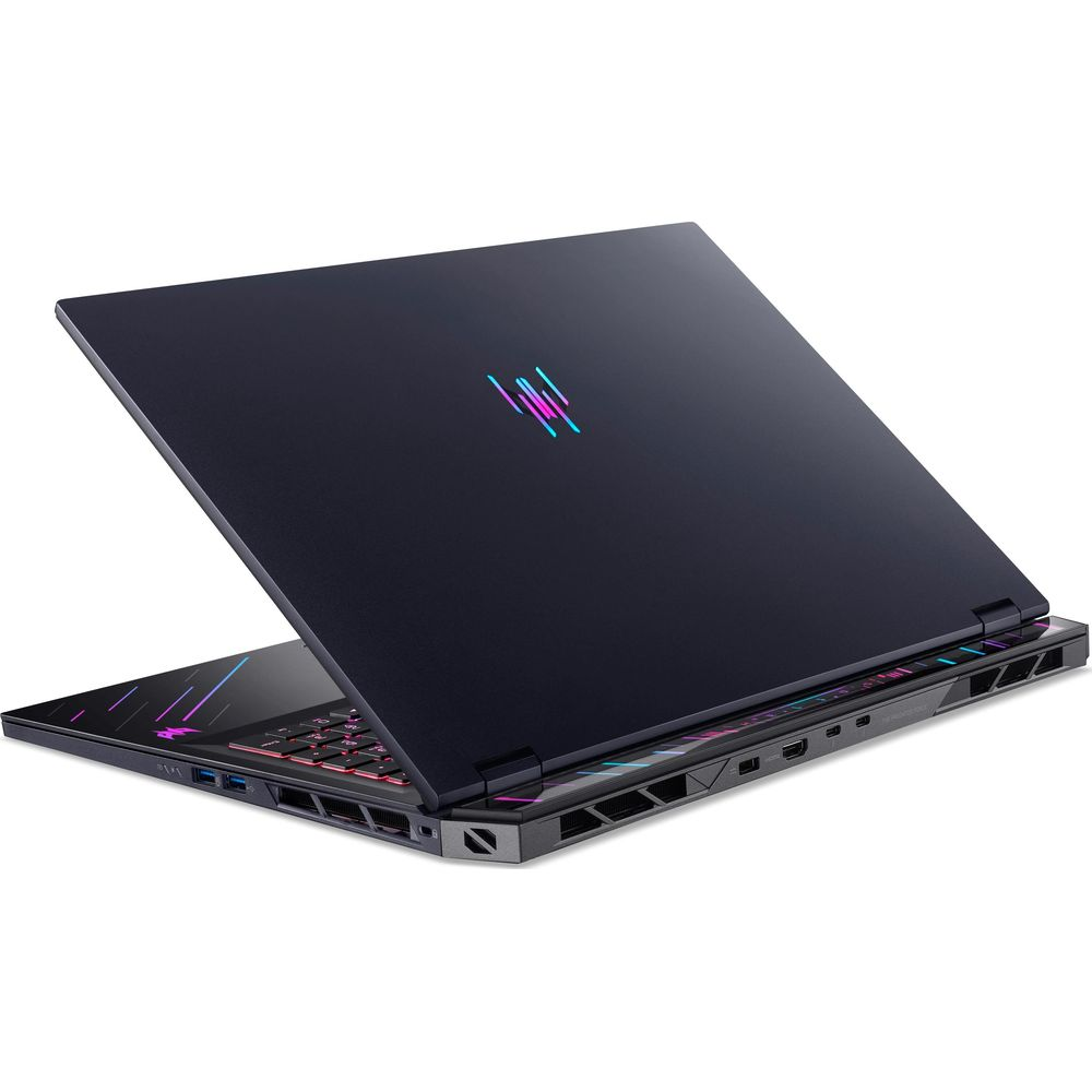 Ein geschlossener, dunkelblauer Laptop mit einem leuchtenden Logo auf dem Deckel und beleuchteter Tastatur.