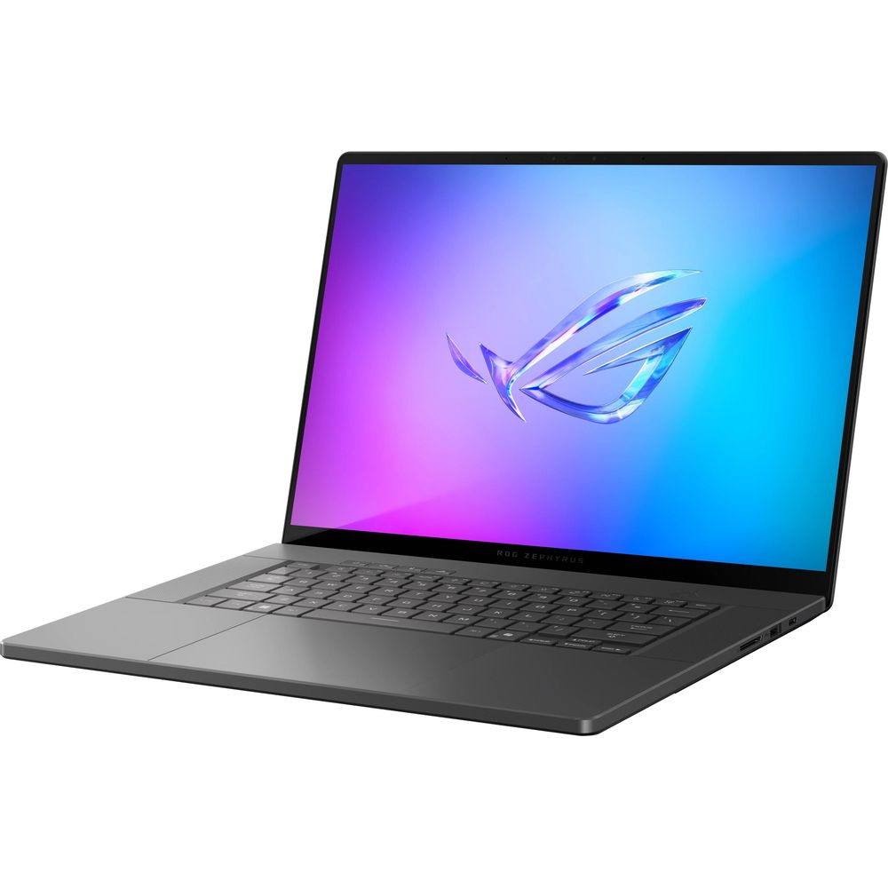 Un laptop Asus ROG Zephyrus grigio con un logo luminoso sul suo schermo.