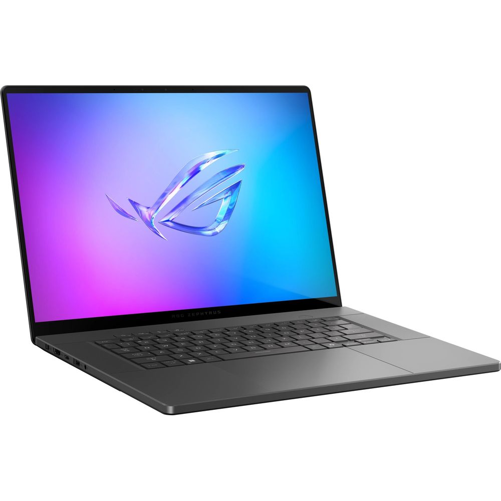 Un laptop scuro chiuso con un logo ROG Zephyrus luminoso sullo schermo.