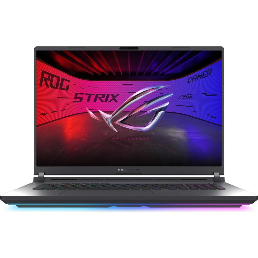 Ein offener Laptop mit beleuchteter Tastatur und ROG Strix Logo auf dem Bildschirm.