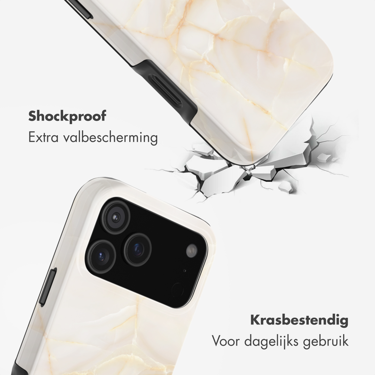Schokbestendige telefoonhoes met marmerpatroon valt op gebarsten grond.