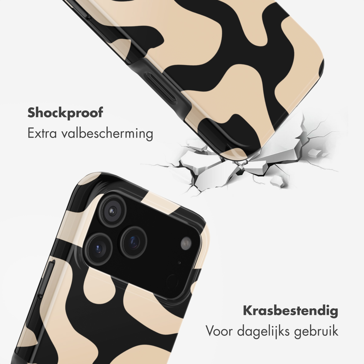 Beige en zwarte telefoonhoes met patroon valt op gebarsten grond.