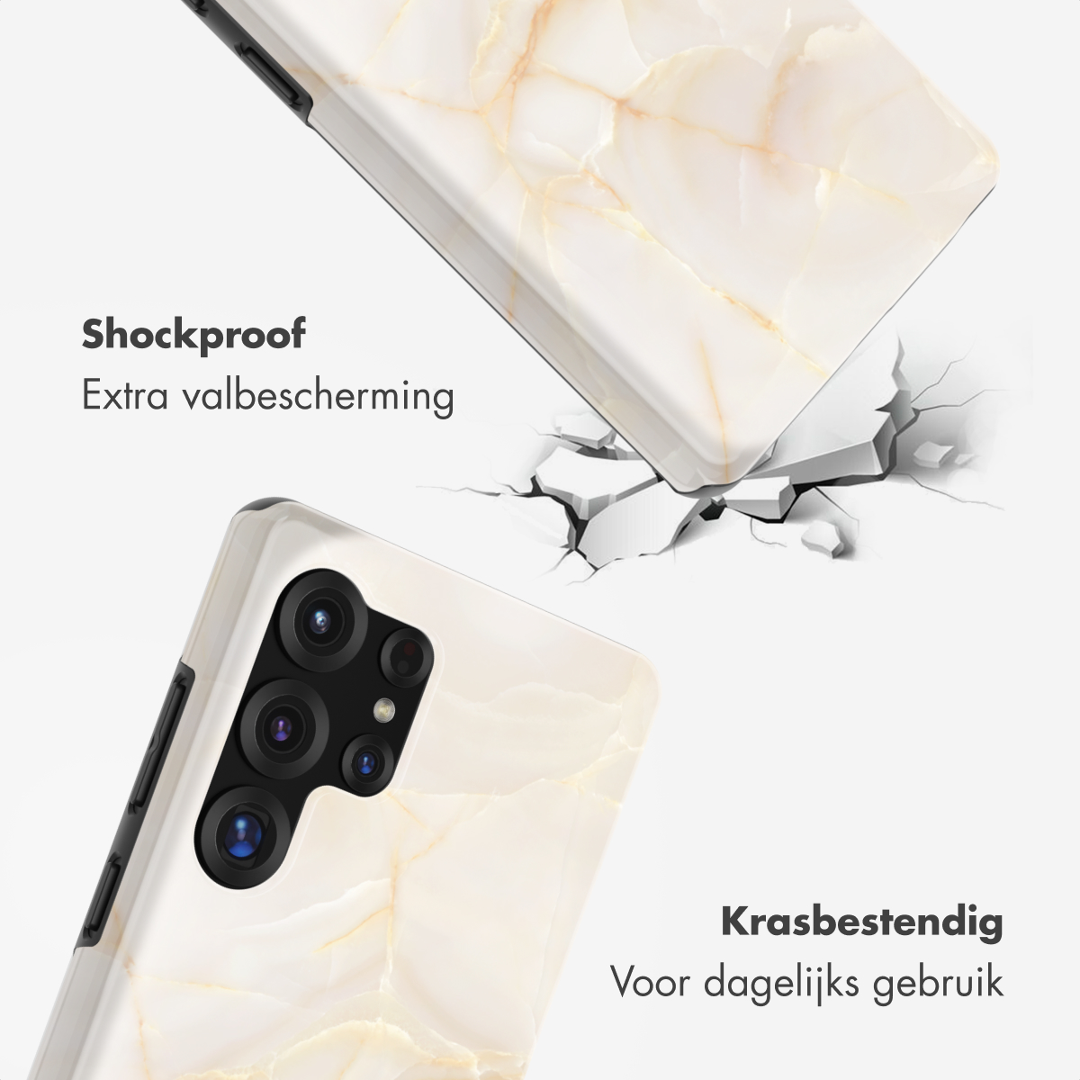 Telefoonhoesje met marmerpatroon valt op gebarsten grond.