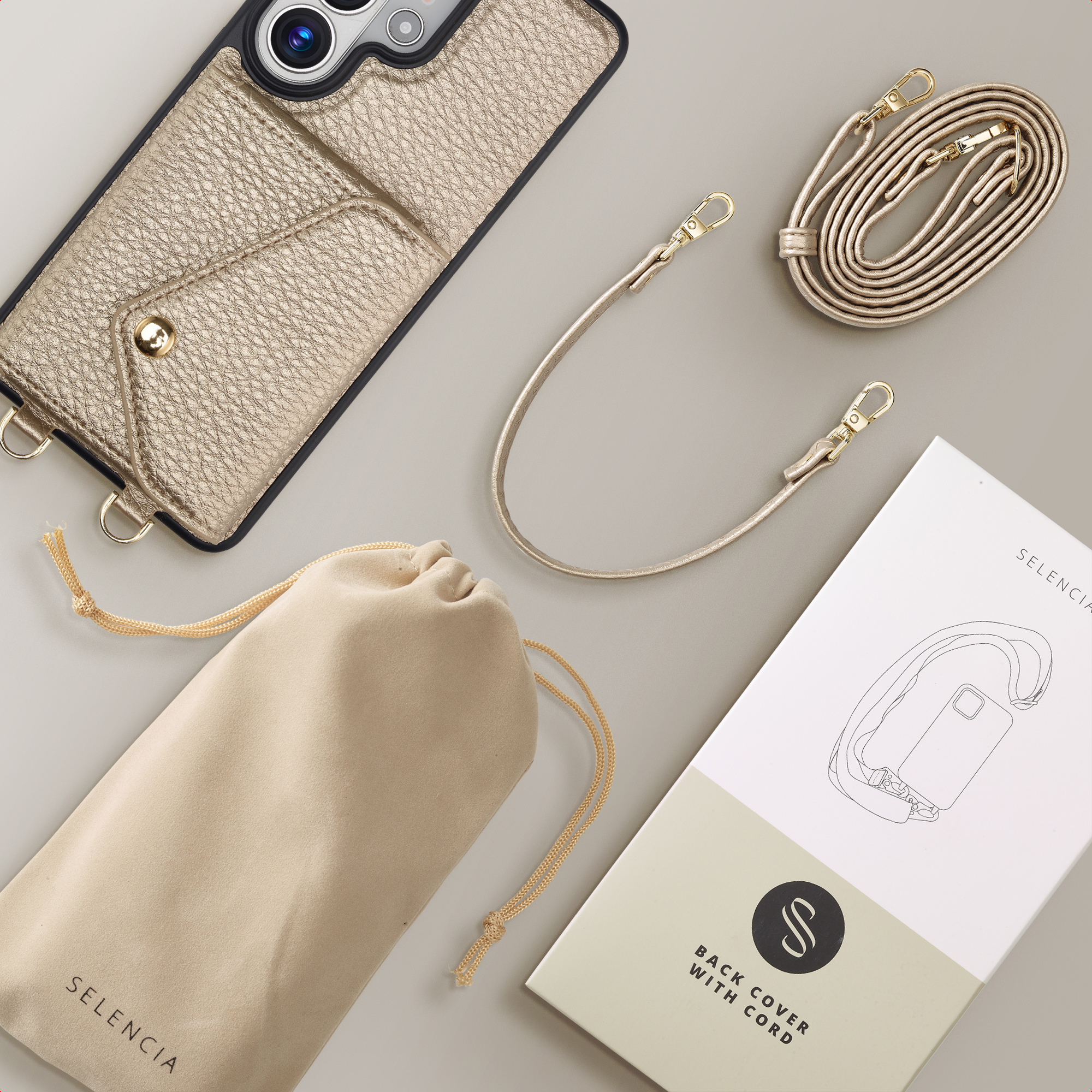 Coque dorée texturée avec fentes, sangle et pochette.