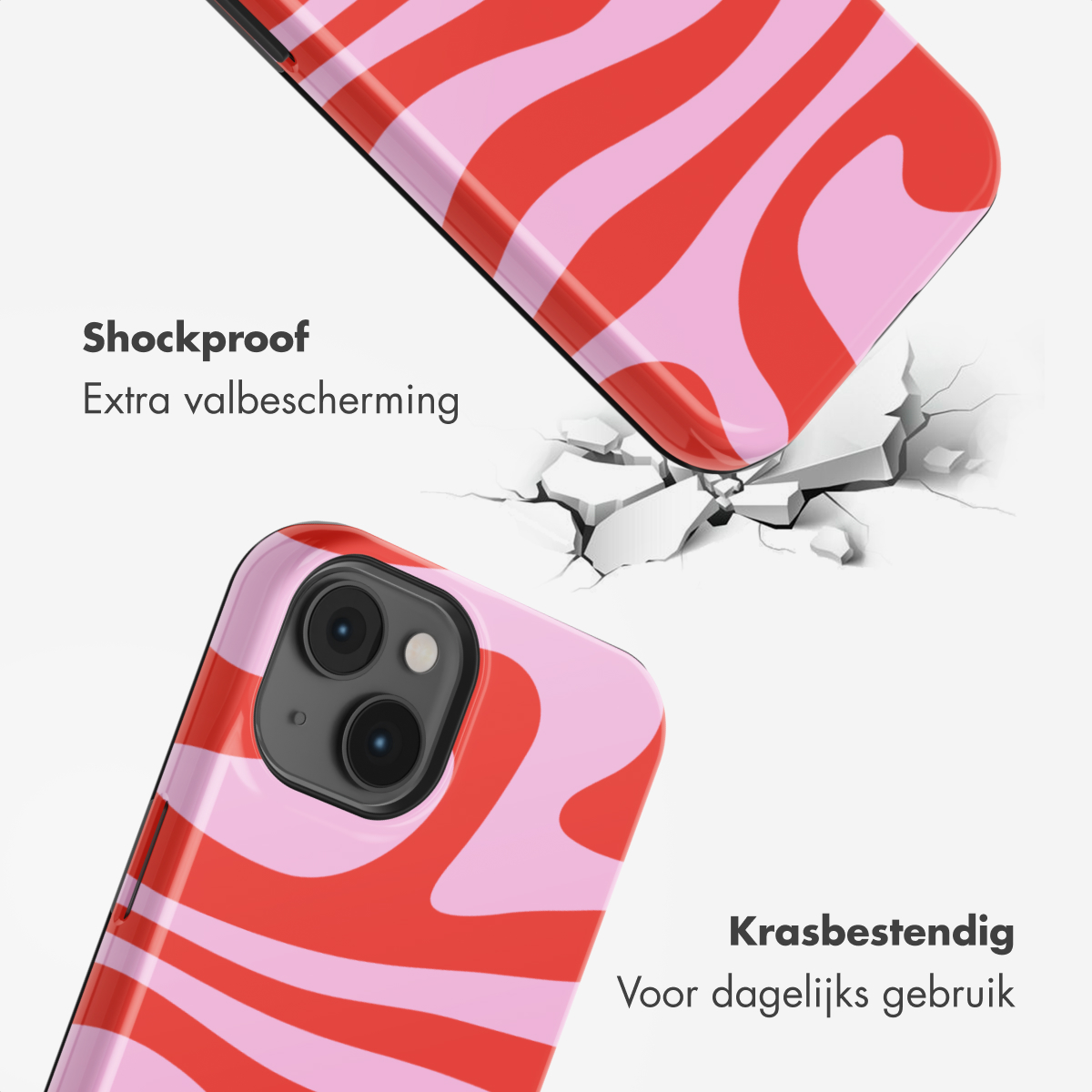 Coque de téléphone rouge et rose à motif ondulé tombant sur un sol fissuré.