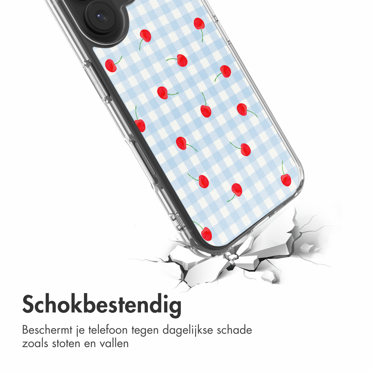 Een doorzichtige telefoonhoes met kersen op blauw geruit patroon breekt door wit oppervlak.