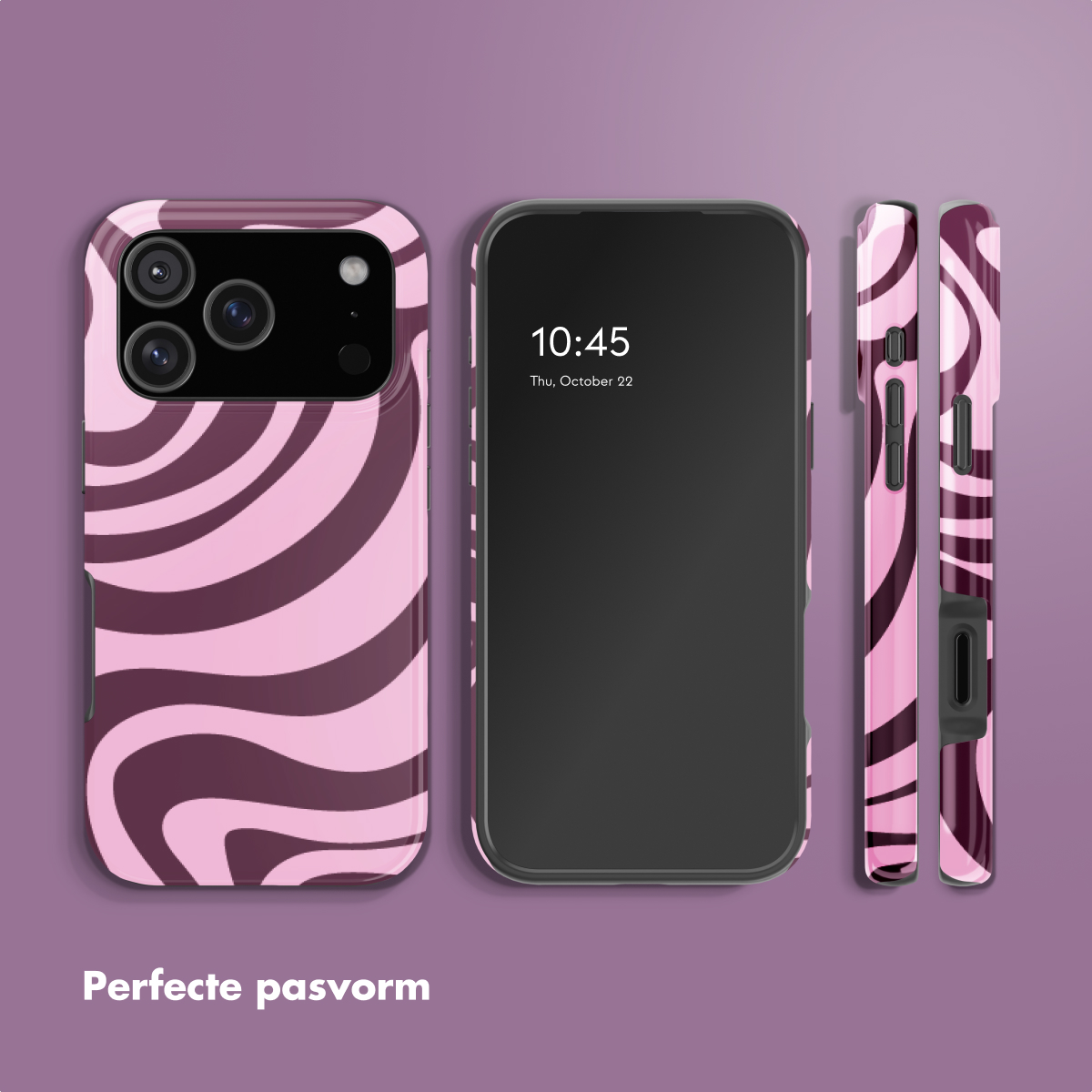 Une coque de téléphone rose à tourbillons marron, à côté d'un téléphone.