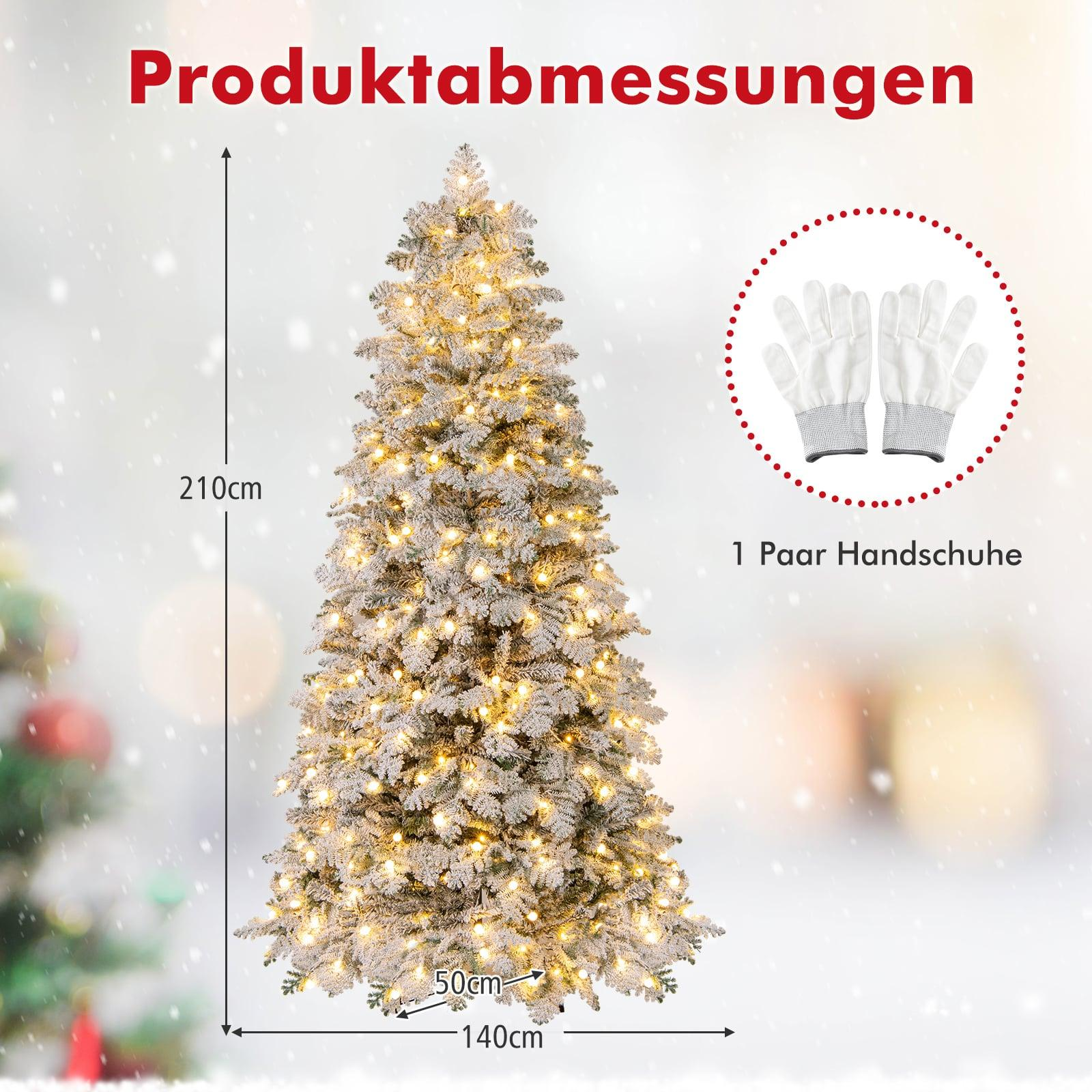 Een verlichte, besneeuwde kerstboom (210cm H, 140cm B) met handschoenen.