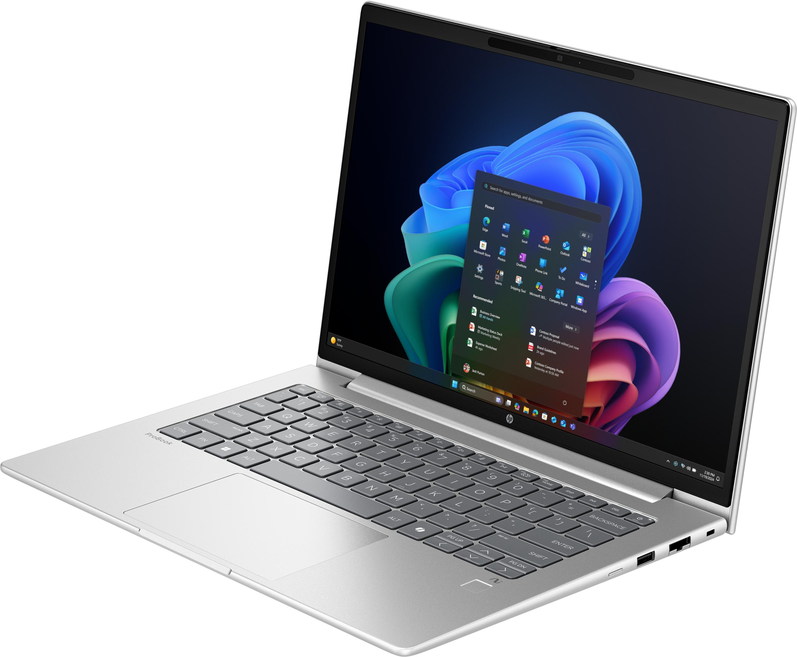 Un laptop argentato con schermo aperto, che mostra un'interfaccia Windows.