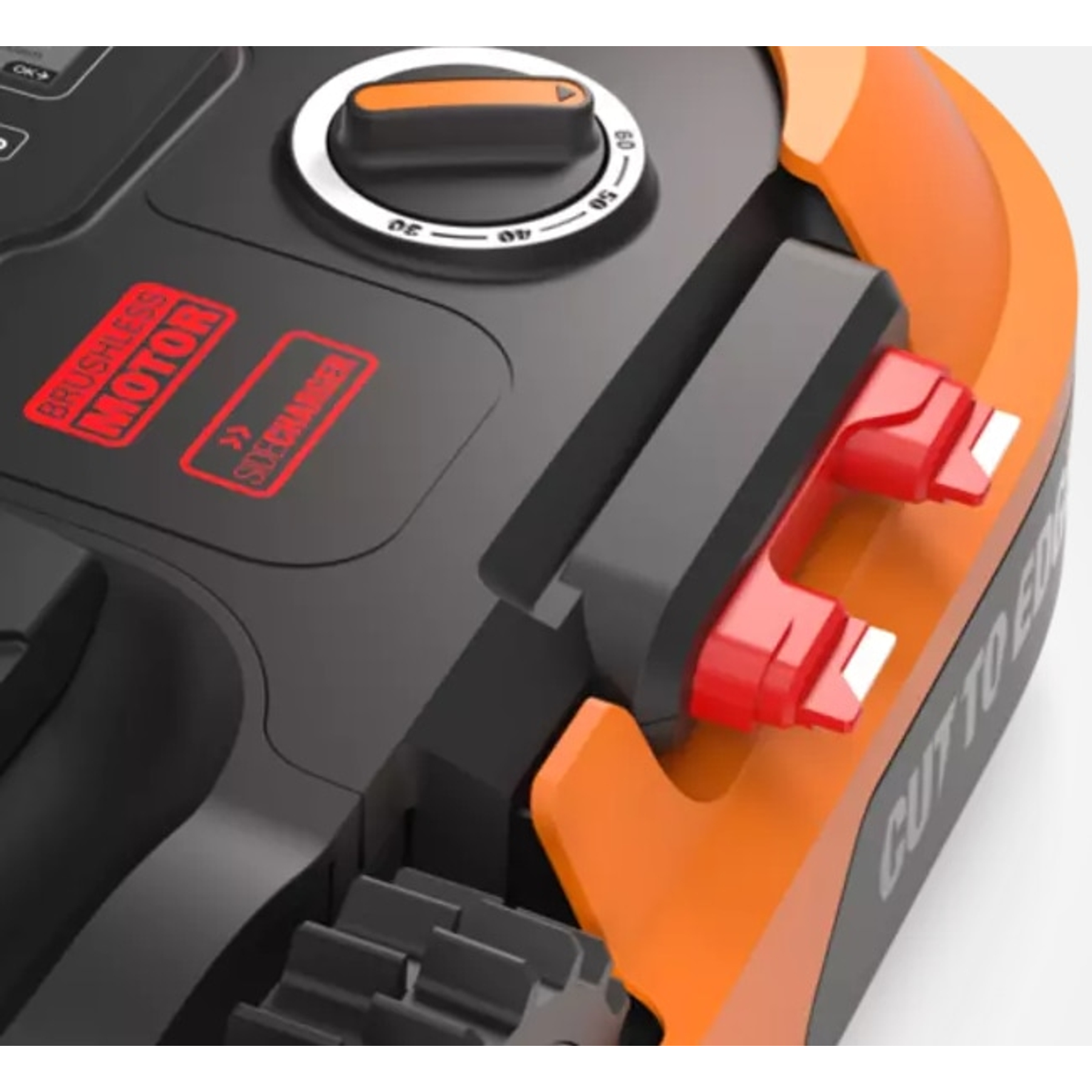 Close-up of a robotic lawnmower with black and orange accents and red controls.