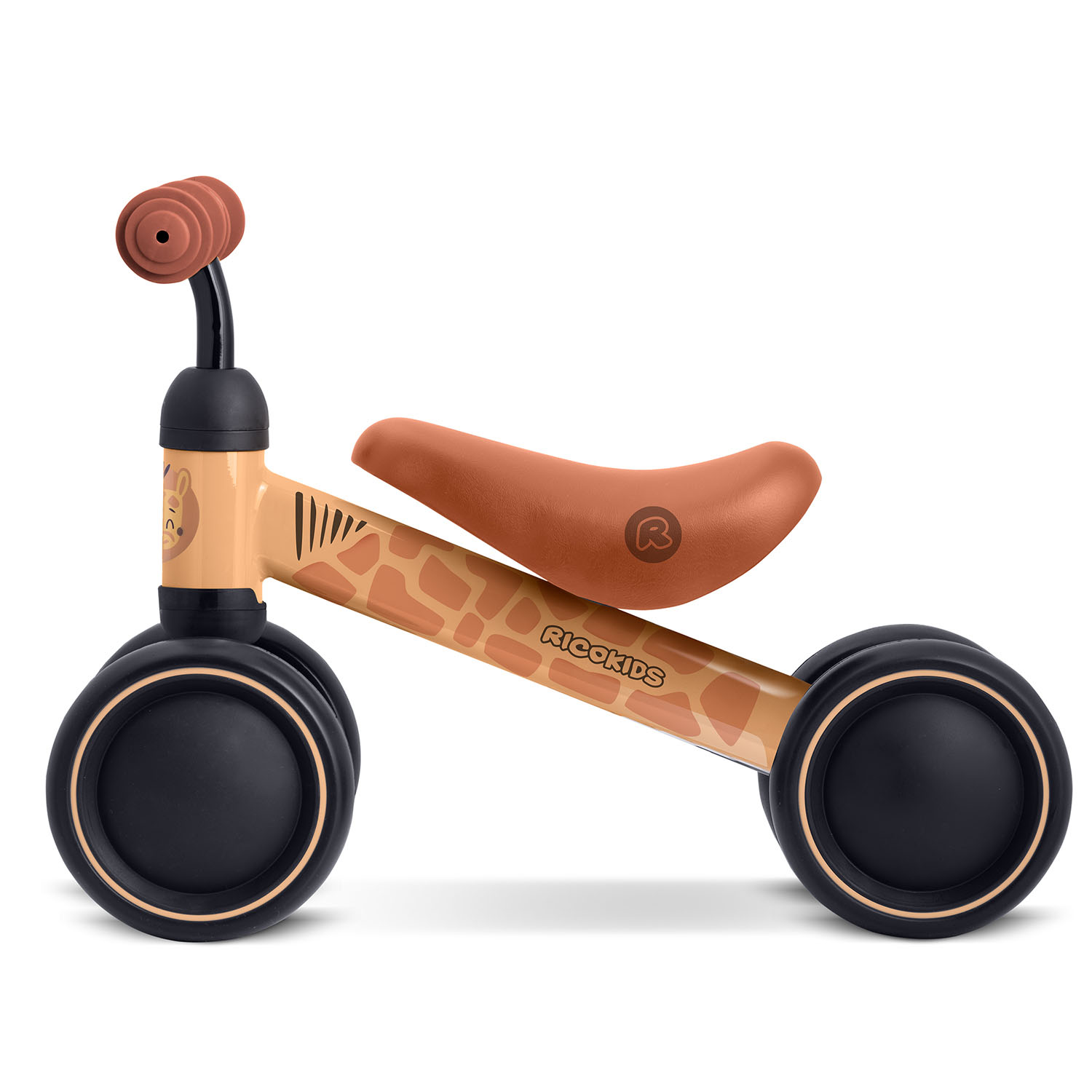 Beżowy rowerek biegowy z motywem żyrafy, brązowym siodełkiem i kierownicą.