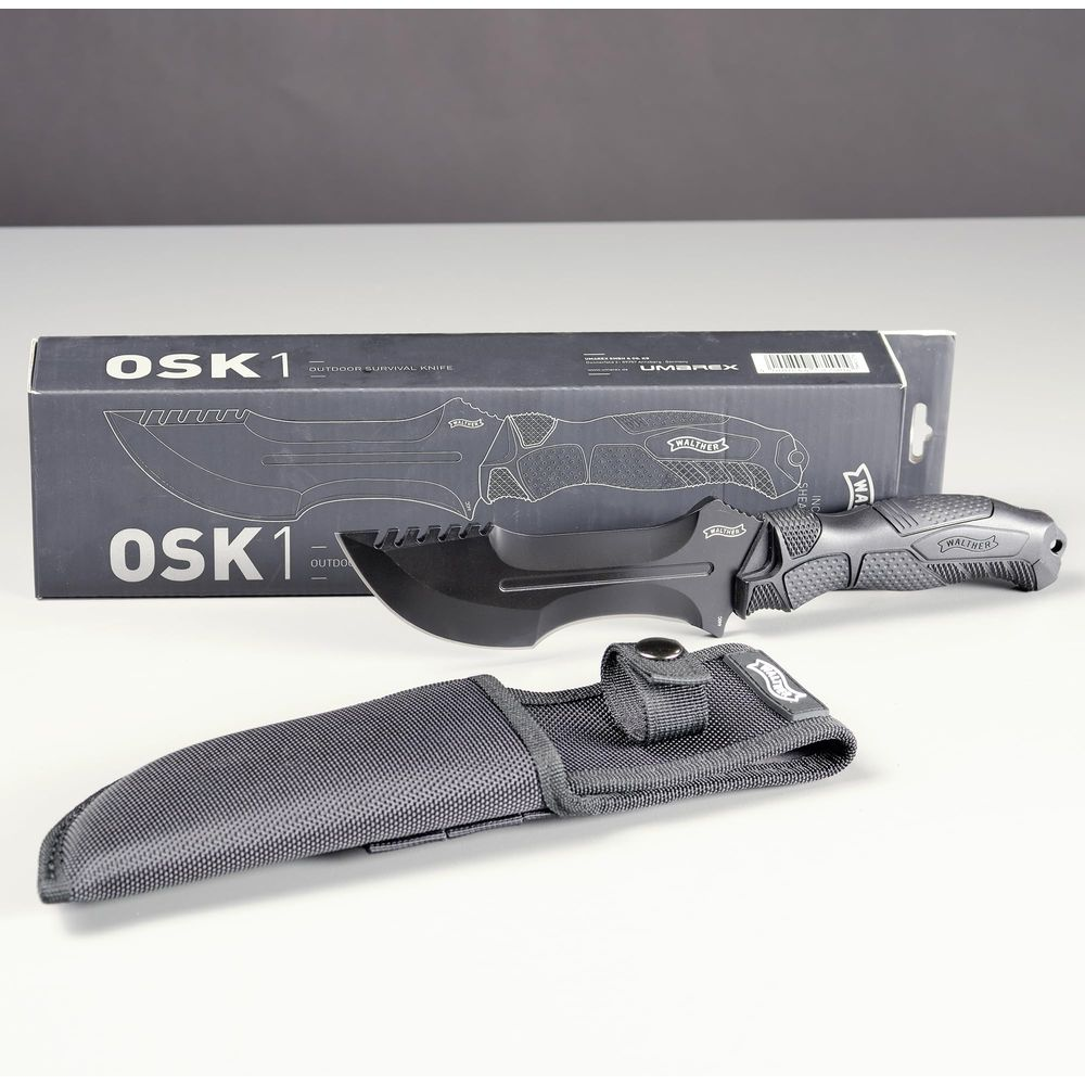 Schwarzes Überlebensmesser mit Scheide und Verpackung. Walther OSK1.