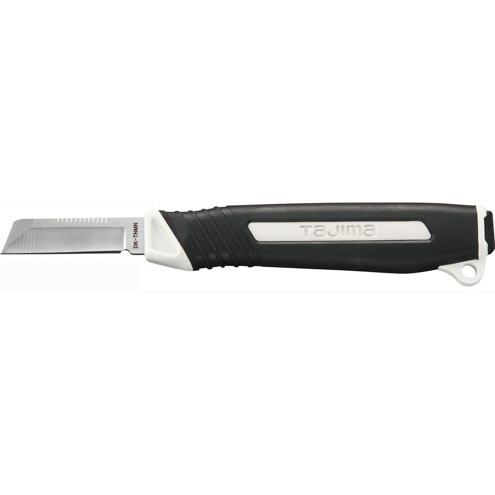 Un cutter noir et blanc avec lame argentée et le nom de la marque Tajima.