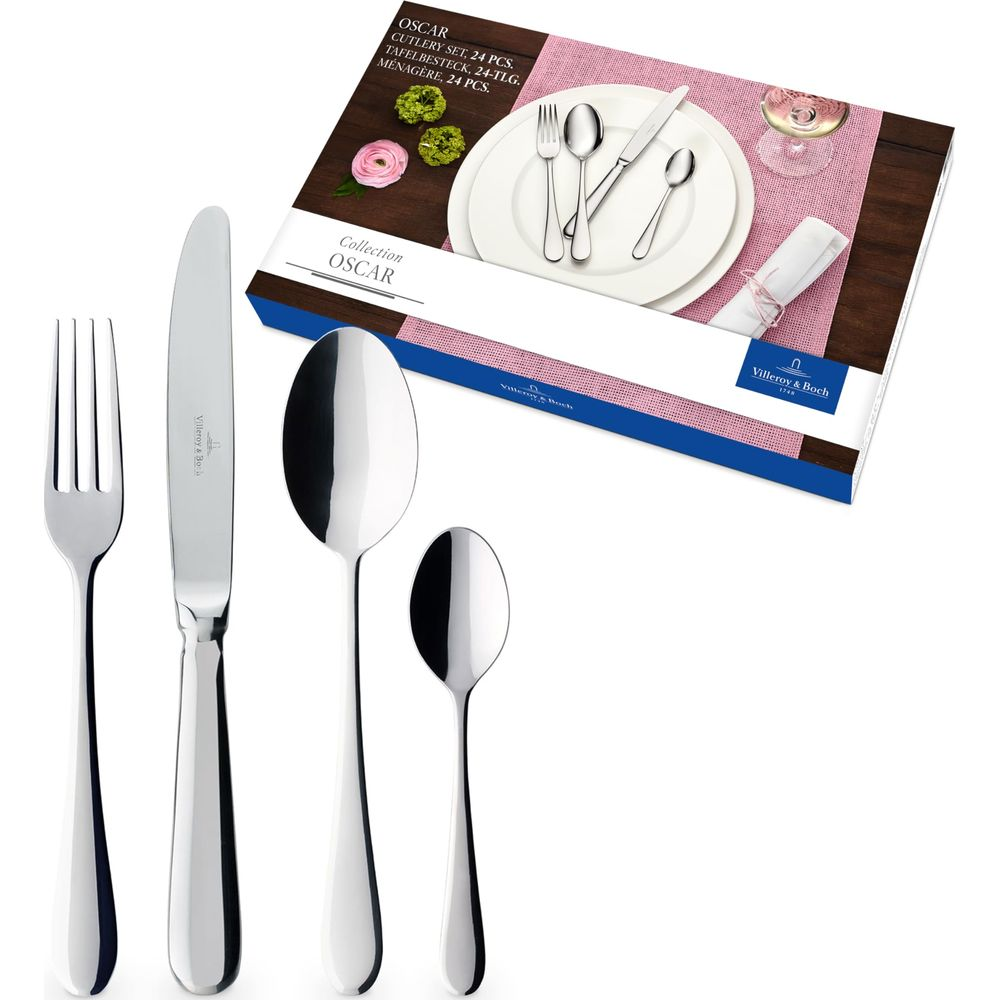 Ein Villeroy & Boch OSCAR Besteckset mit Gabel, Messer, Löffel und kleinem Löffel.