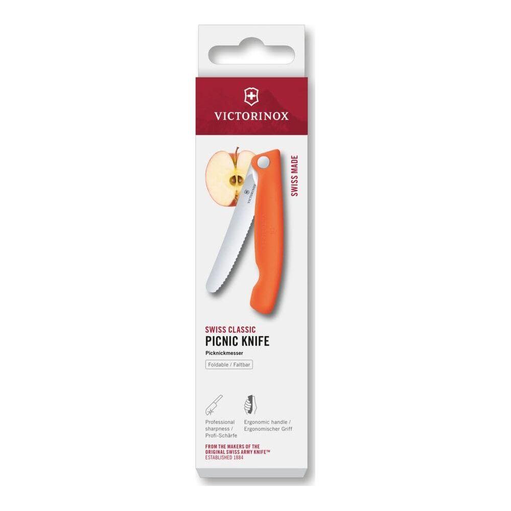 Verpackung für ein orangefarbenes Victorinox Picknickmesser mit Apfelscheibe.