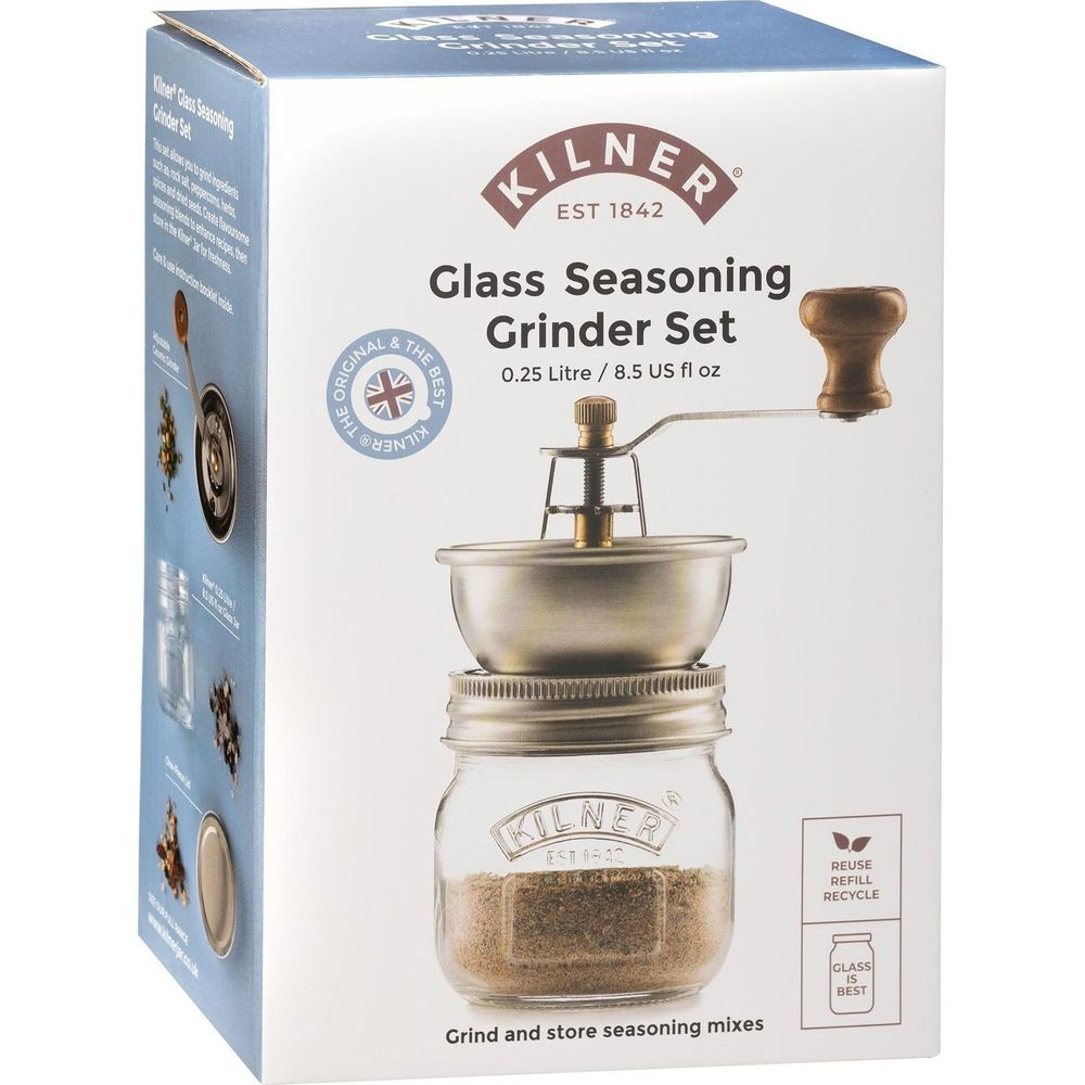 Kilner Glas-Gewürz-Mühlen-Set mit Holzkurbel und Glasbehälter, gefüllt mit Gewürzen.