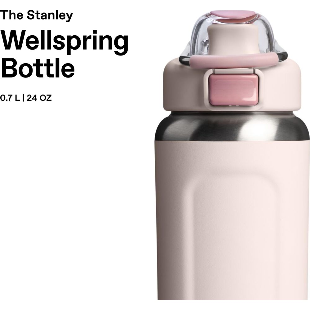 Eine rosafarbene Stanley Wellspring-Flasche mit silbernem Deckel und pinkem Detail.