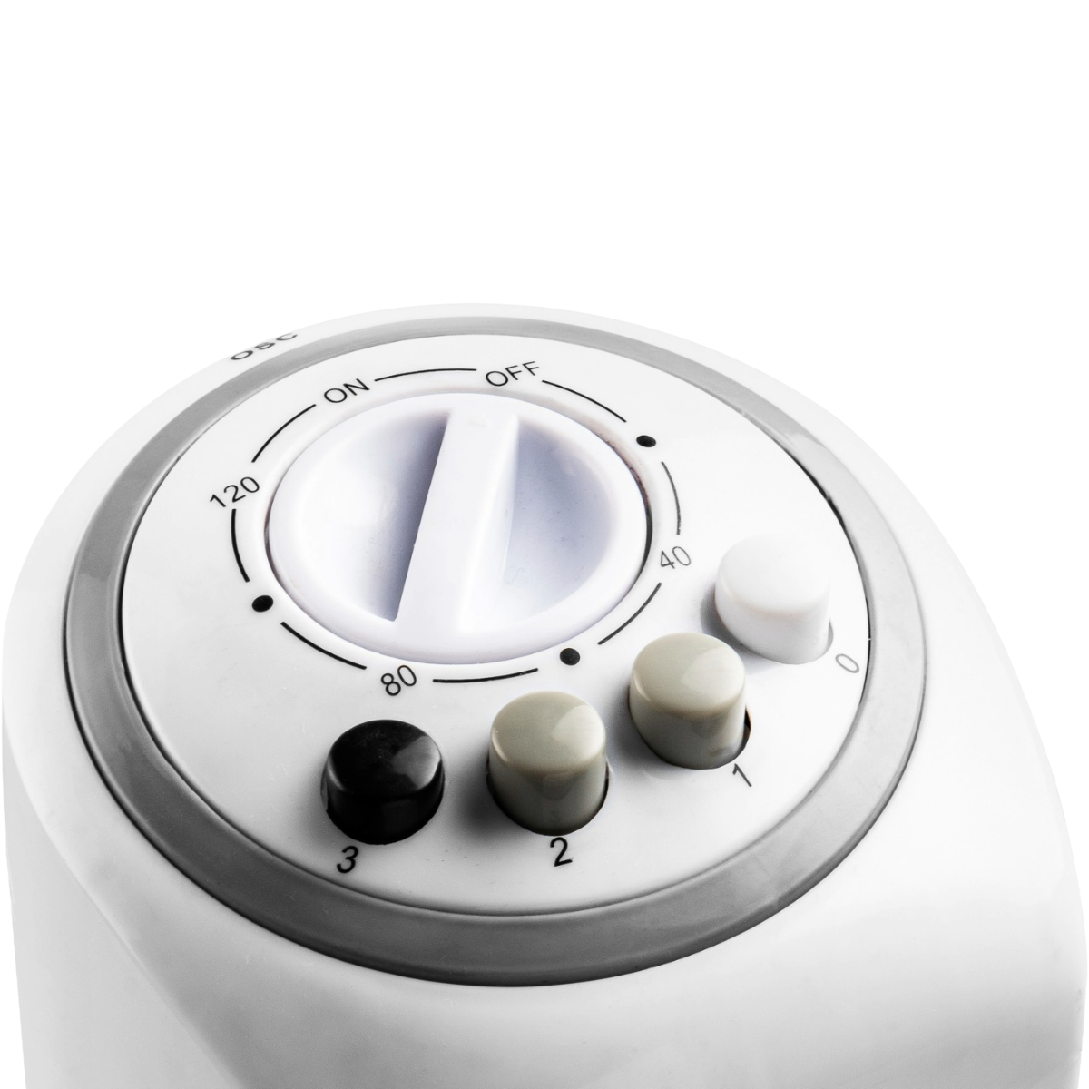 A white control panel featuring a large dial and three smaller knobs.