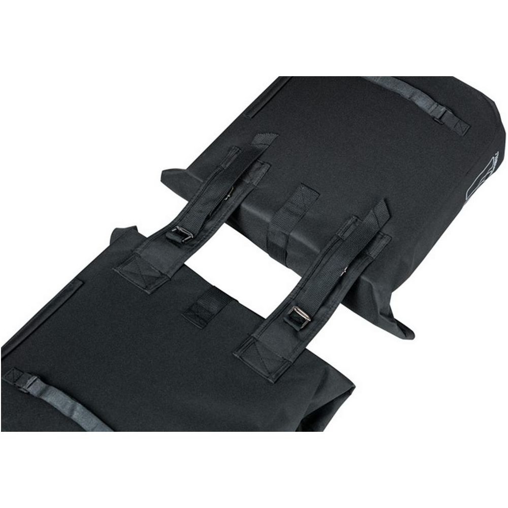 Sac noir avec sangles et boucles, sur fond blanc.