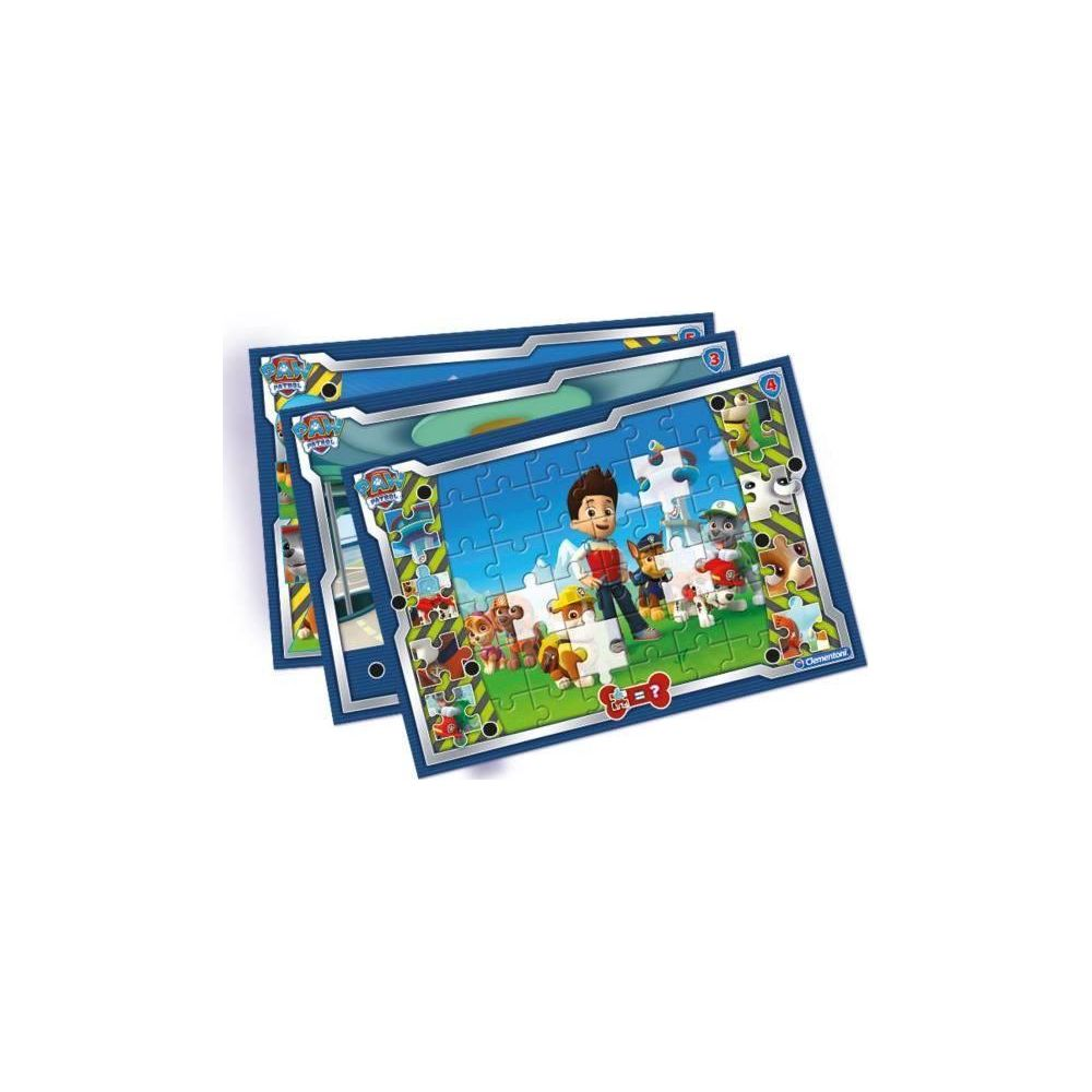 Un puzzle Paw Patrol con Ryder e cani in piedi su un campo verde.
