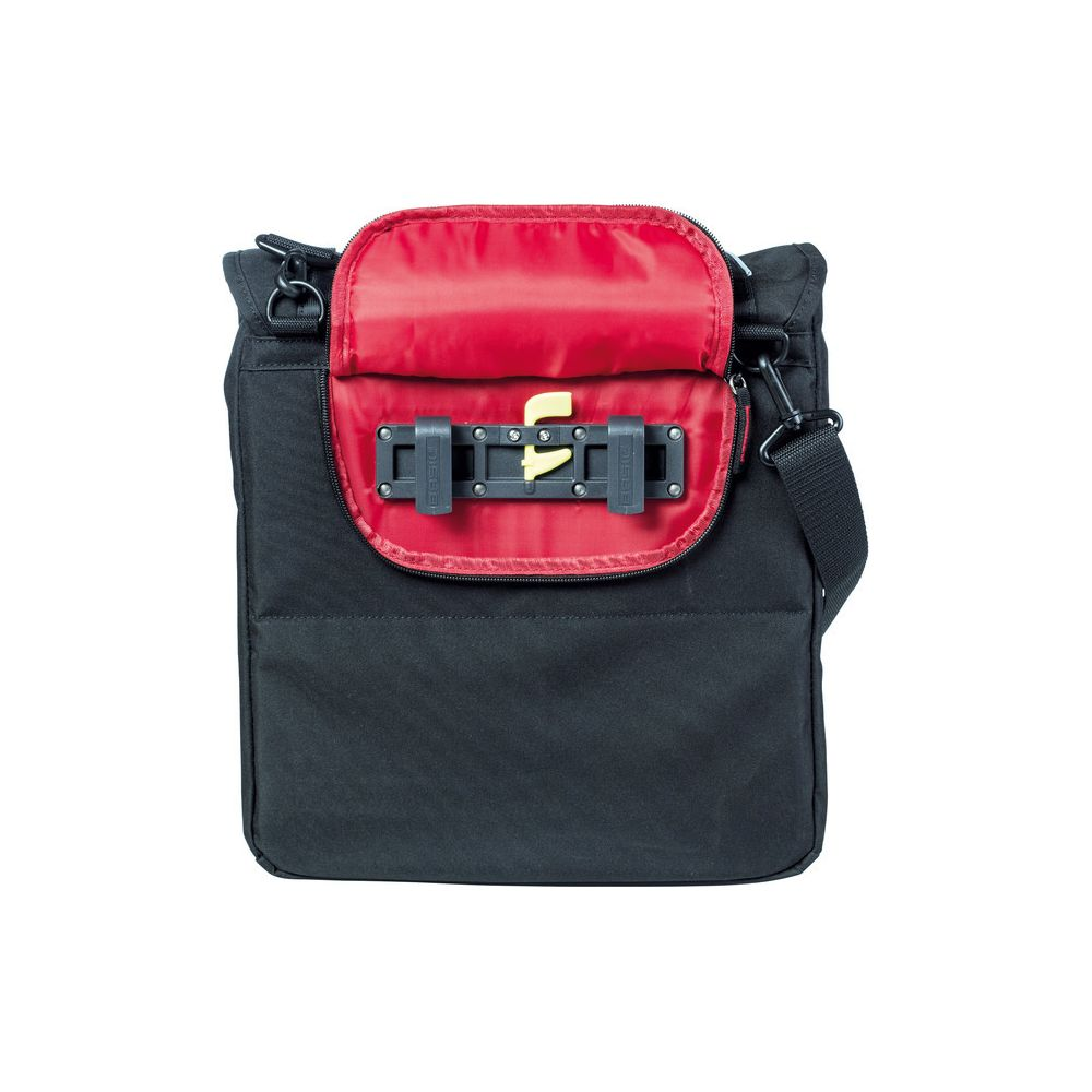 Schwarze Tasche mit rotem Innenfutter und Klickhalterung.