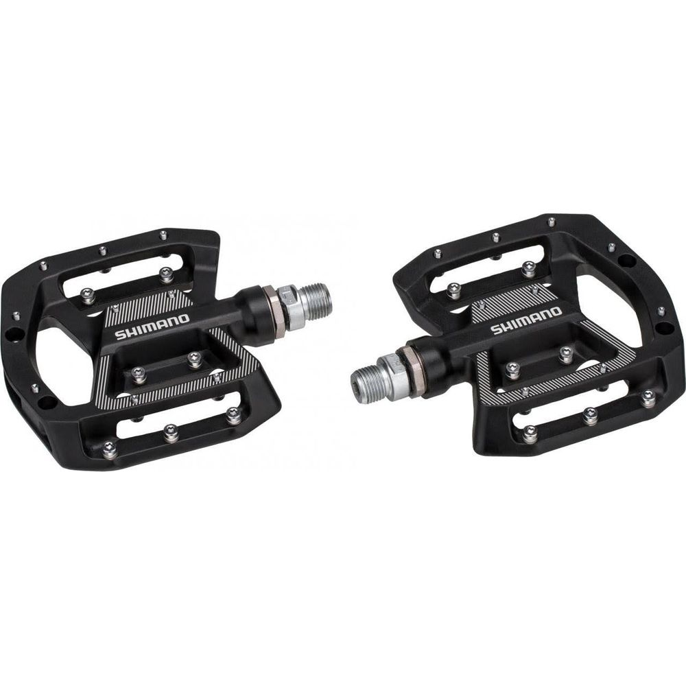Schwarze Fahrradpedale mit SHIMANO-Logo und silbernen Gewinden.
