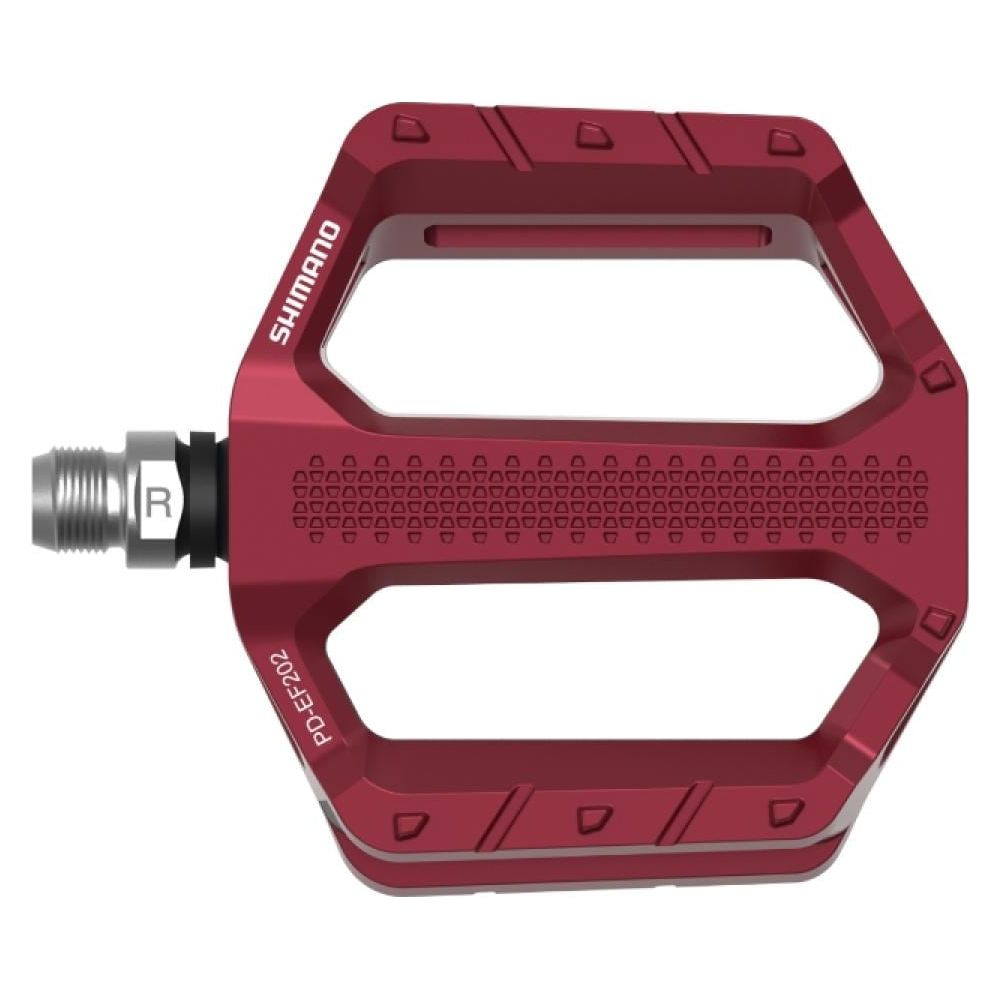 Ein roter Fahrradpedal mit SHIMANO-Logo und PD-EF202-Aufschrift.
