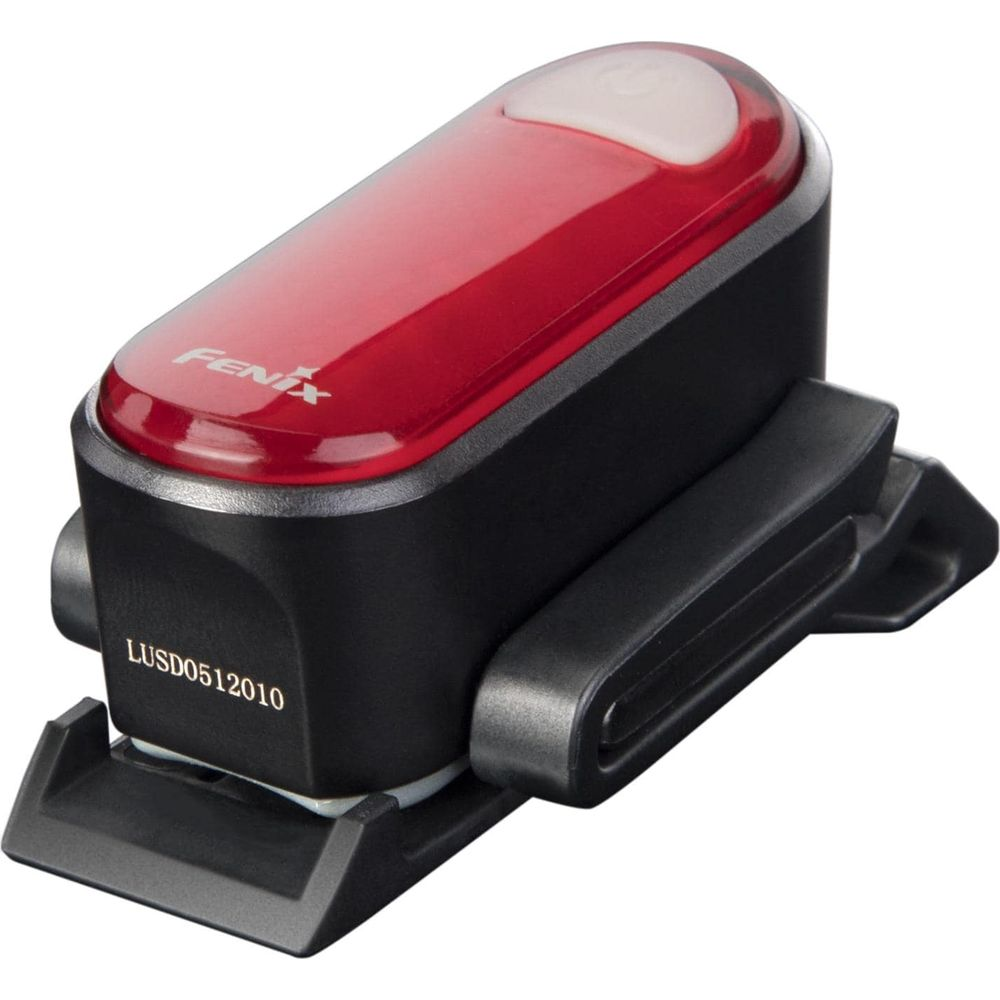 Rote und schwarze Fenix-Lampe mit weißem Knopf auf schwarzer Halterung.