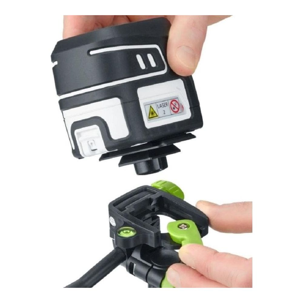 Un appareil laser noir est fixé sur un support noir avec des leviers verts.