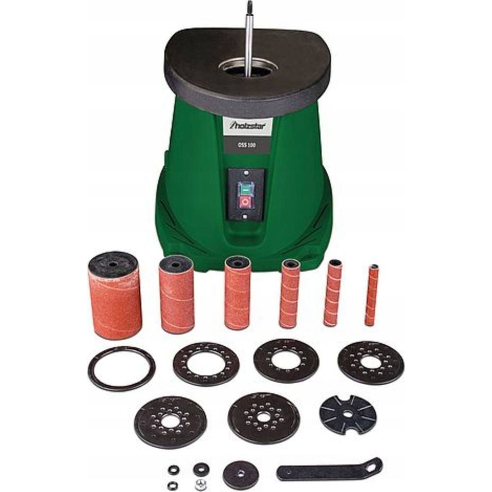Machine à poncer verte avec accessoires : tambours, disques et outil.