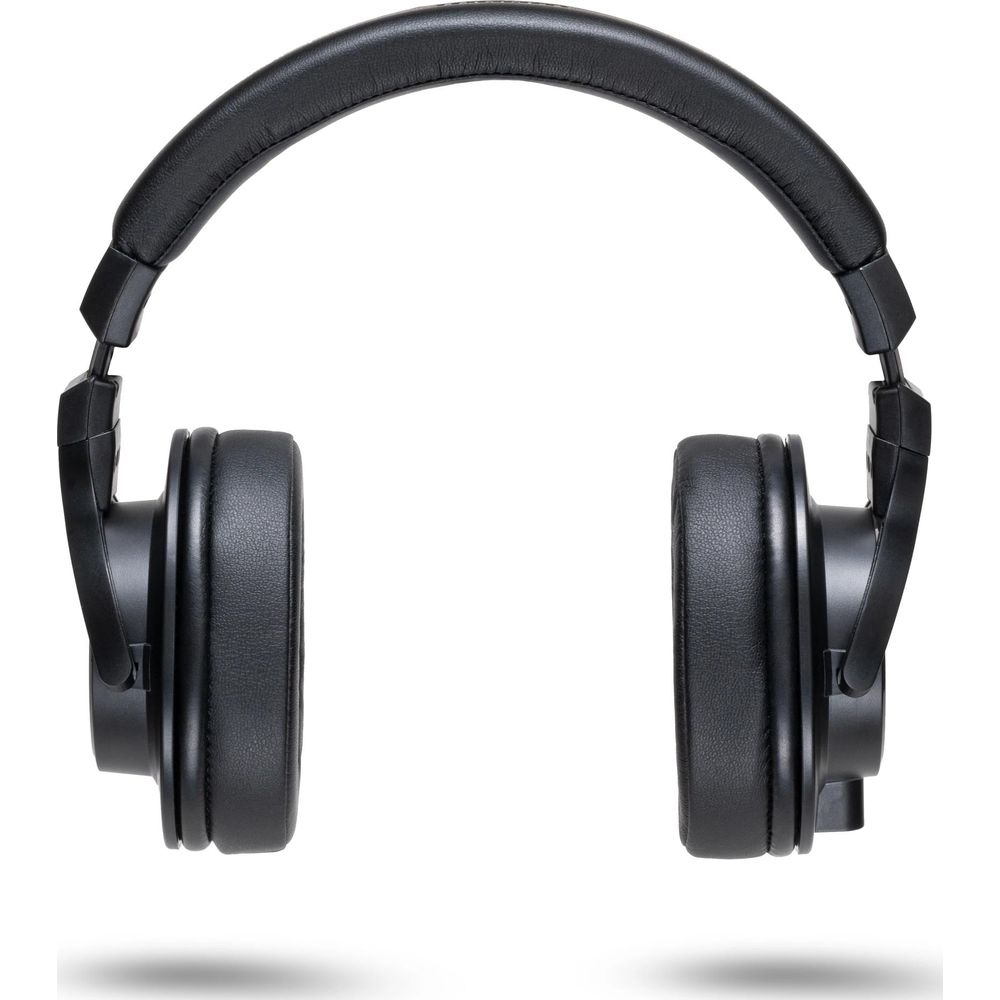 Casque circum-aural noir avec arceau rembourré, isolé sur fond blanc.