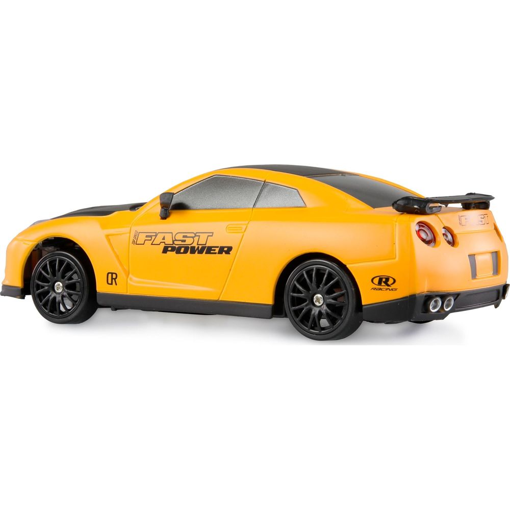 Ein gelbes Spielzeugauto mit schwarzem Dach und Spoiler, Aufschrift Fast Power.