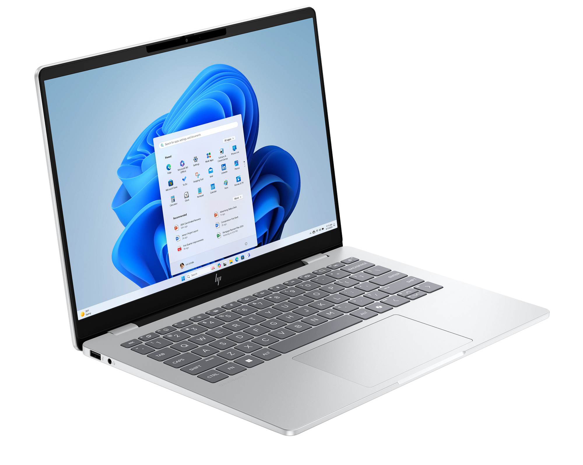 Ein silberner Laptop mit einem geöffneten Startmenü und einem blauen Hintergrundbild.