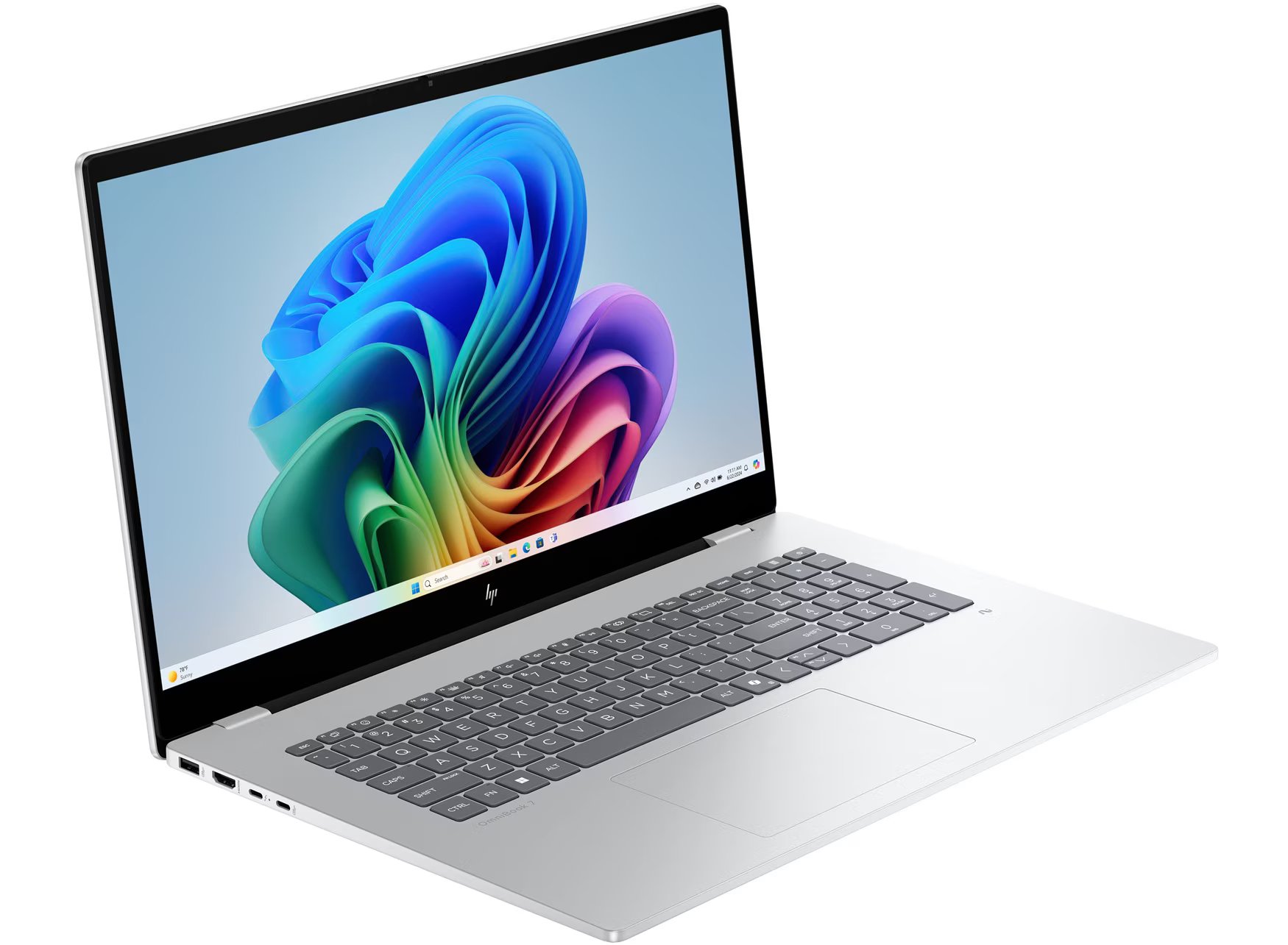 Ein silberner HP Laptop mit einem farbenfrohen Hintergrundbild auf dem Bildschirm.