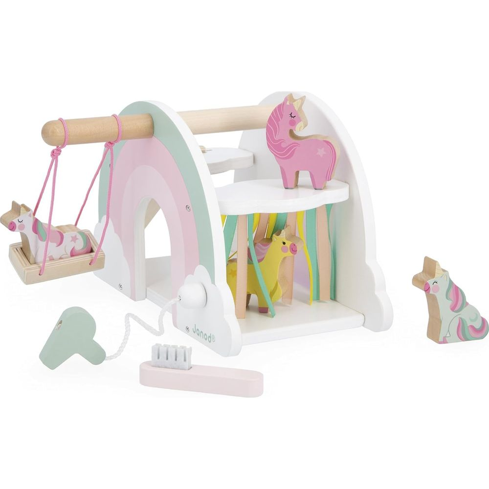 Holzspielzeug mit Einhörnern, Regenbogen und Zubehör wie Bürste und Föhn.