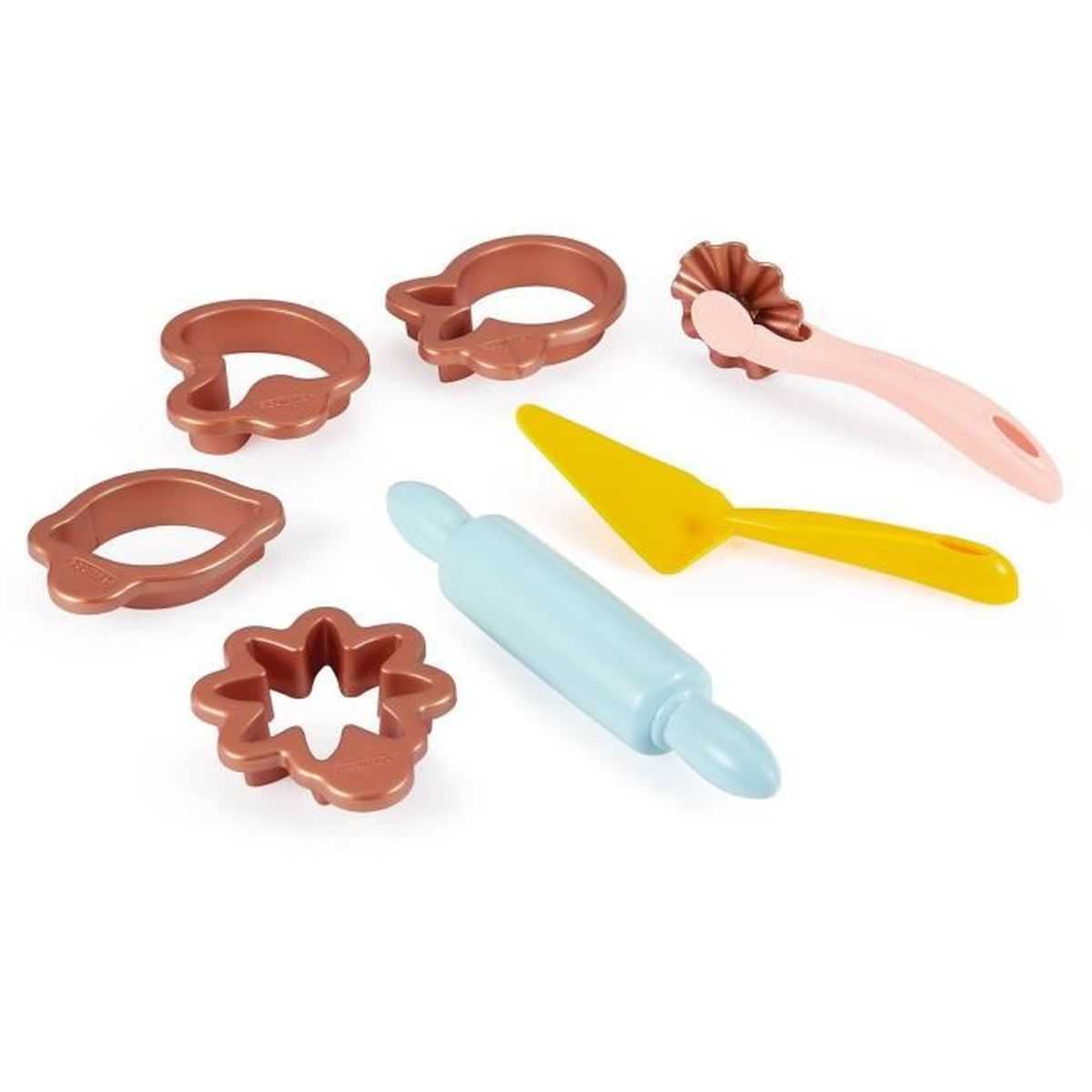 Verschiedene Ausstechformen, ein blauer Teigroller, ein gelber Spatel und ein rosa Teigrad.