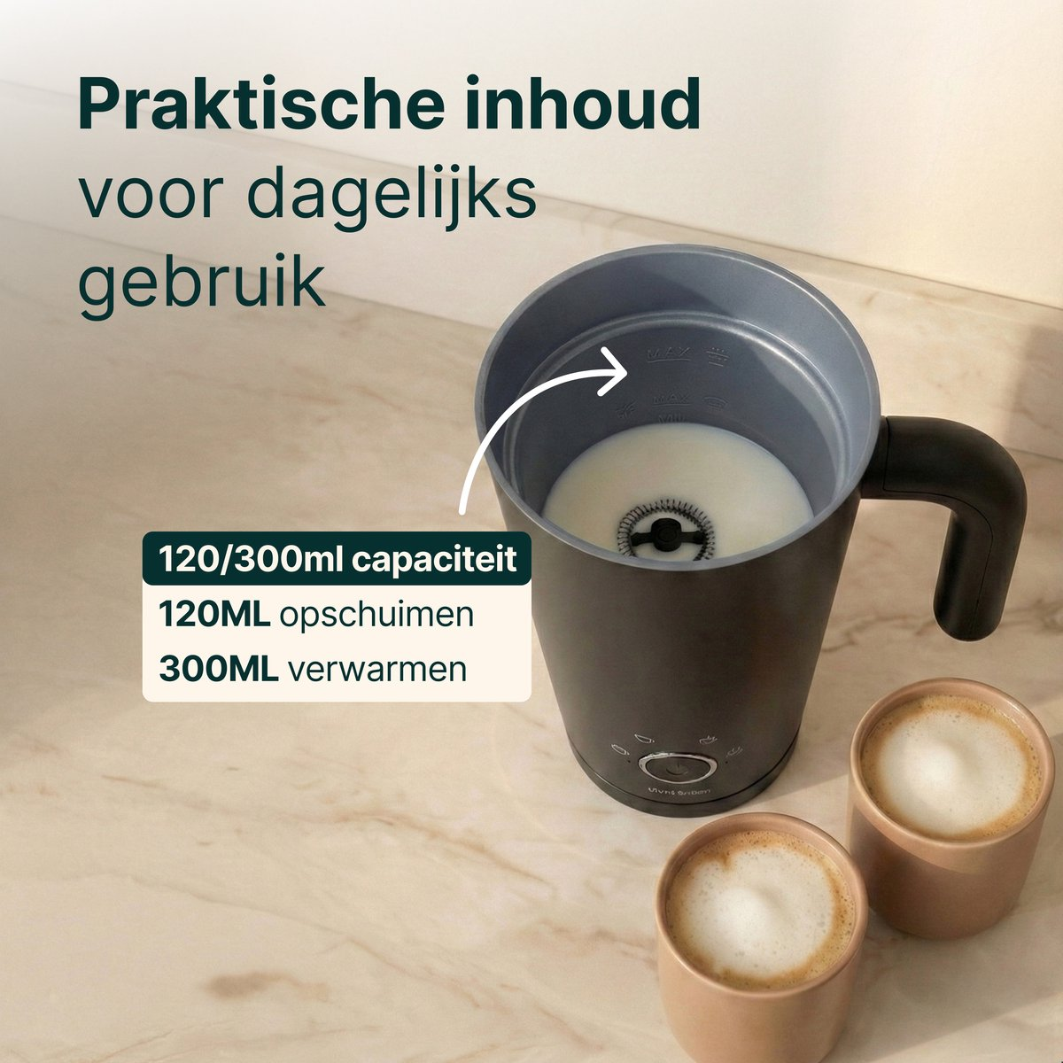 Milk frother with two cups of coffee on a marble surface.