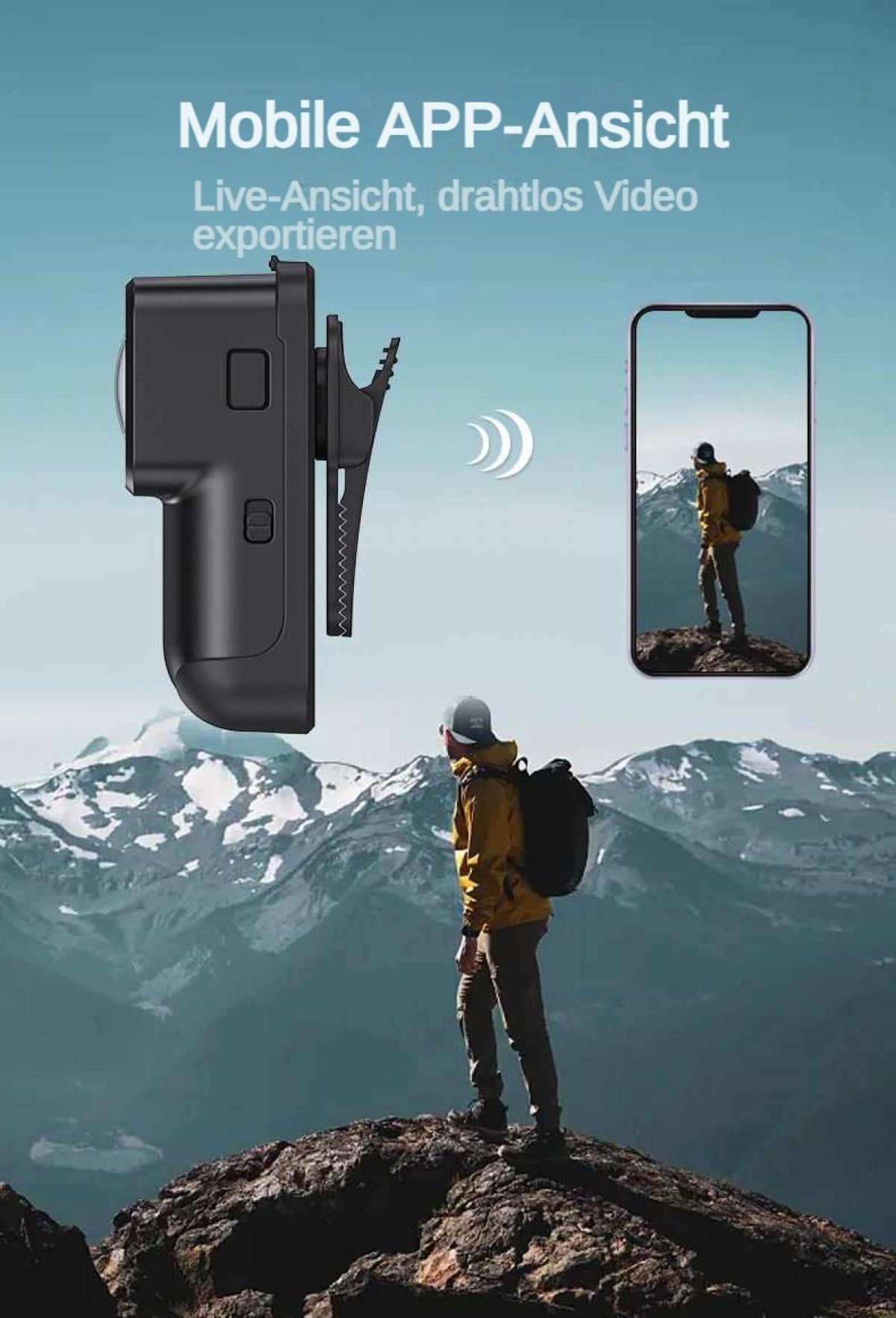 Ein Wanderer mit Rucksack auf einem Felsen vor Berglandschaft.