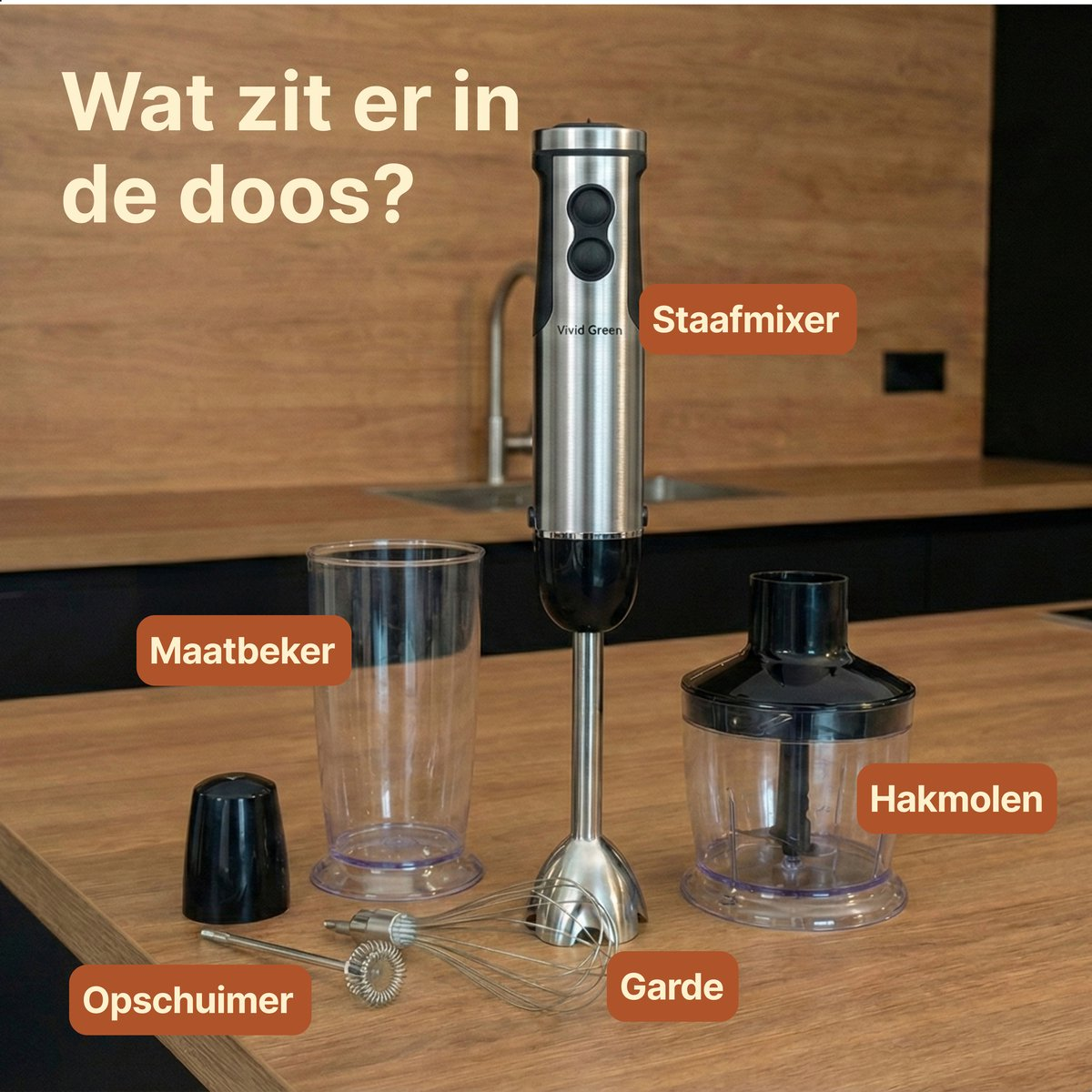 Hand blender with accessories: measuring cup, whisk, chopper on a wooden table.