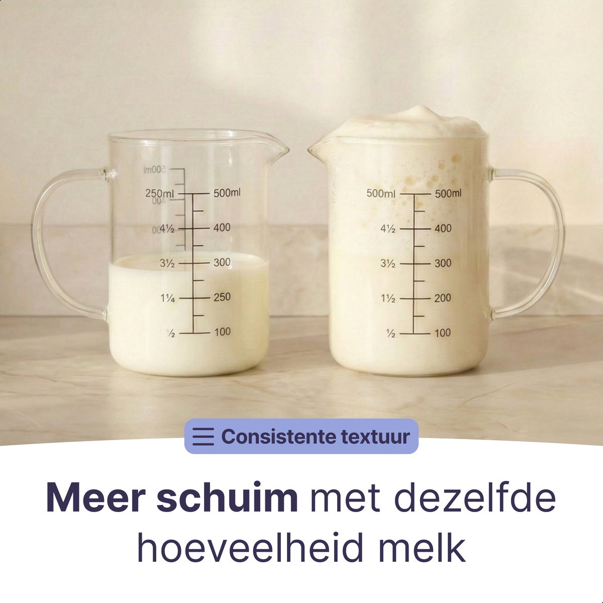 Two measuring cups on a counter, one with milk, the other with frothed milk.