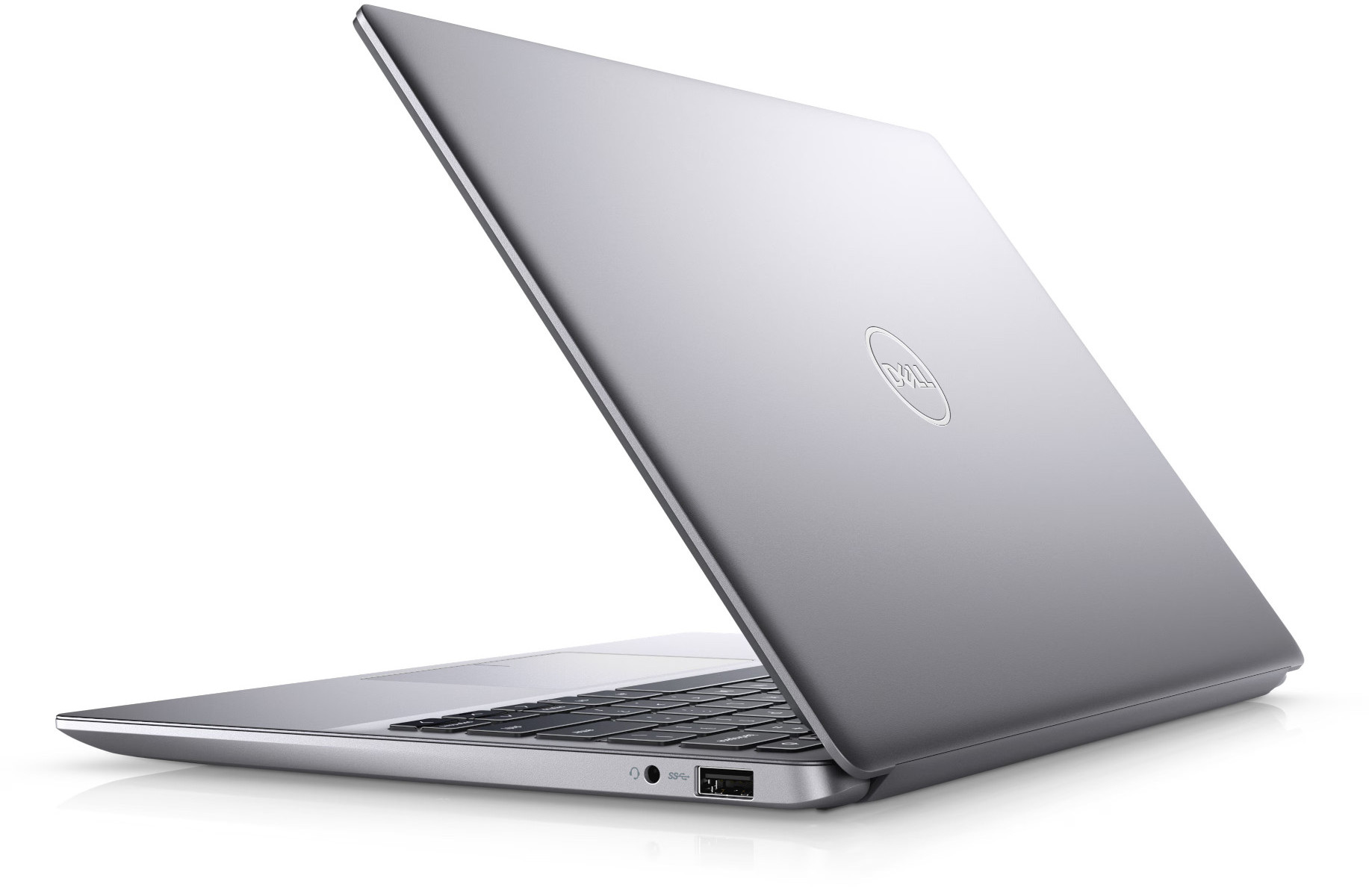 Ein silberner Dell Laptop mit geöffnetem Deckel, Blick auf die Tastatur und das Logo.