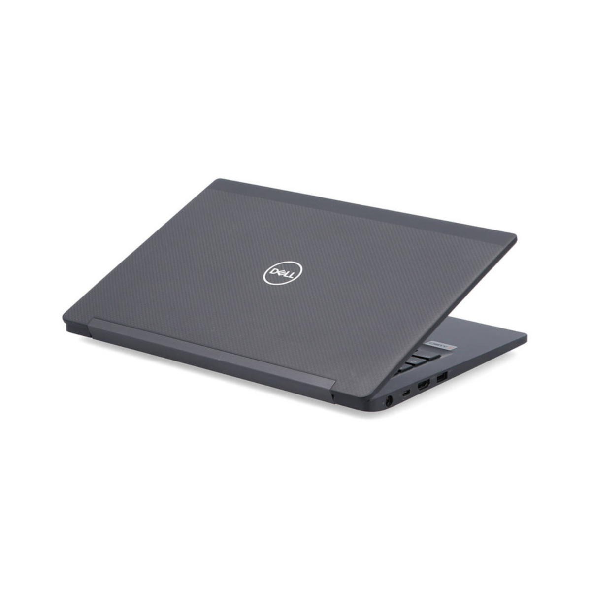 Ein geschlossener grauer Dell Laptop mit Textur auf dem Deckel.